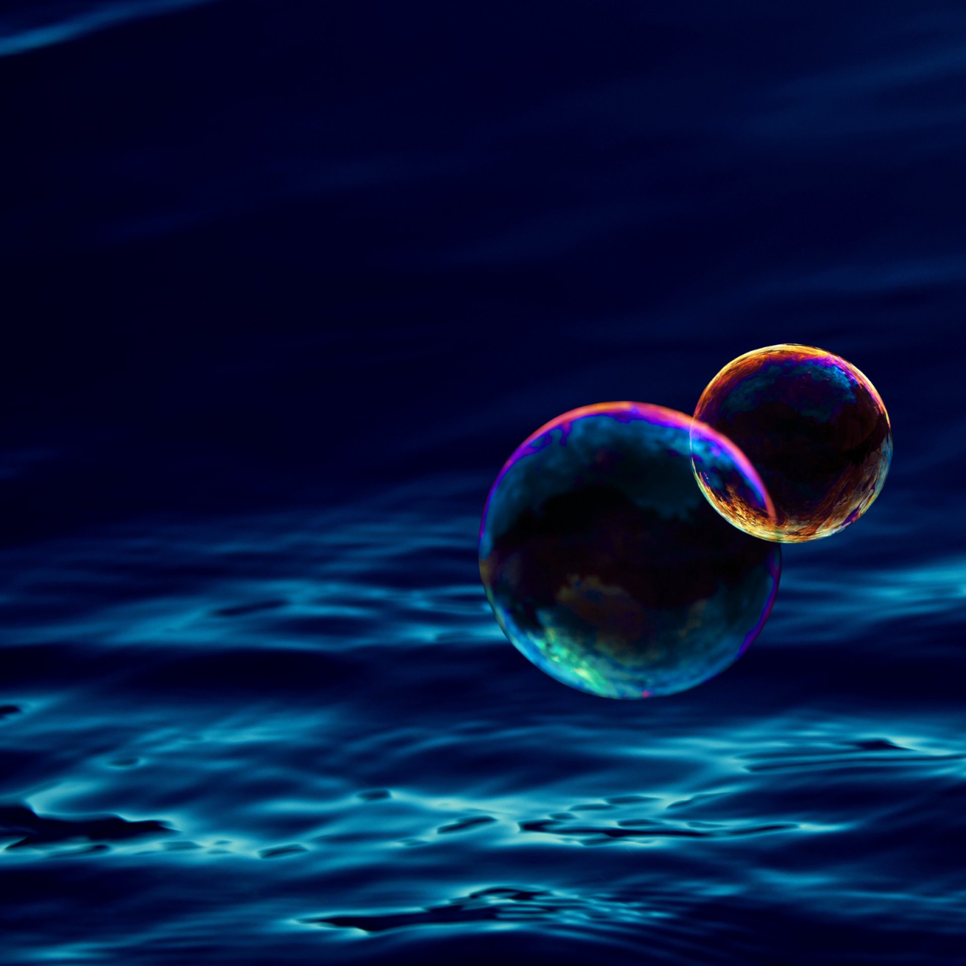 an abstract photo of a curved building with a blue sky in the background