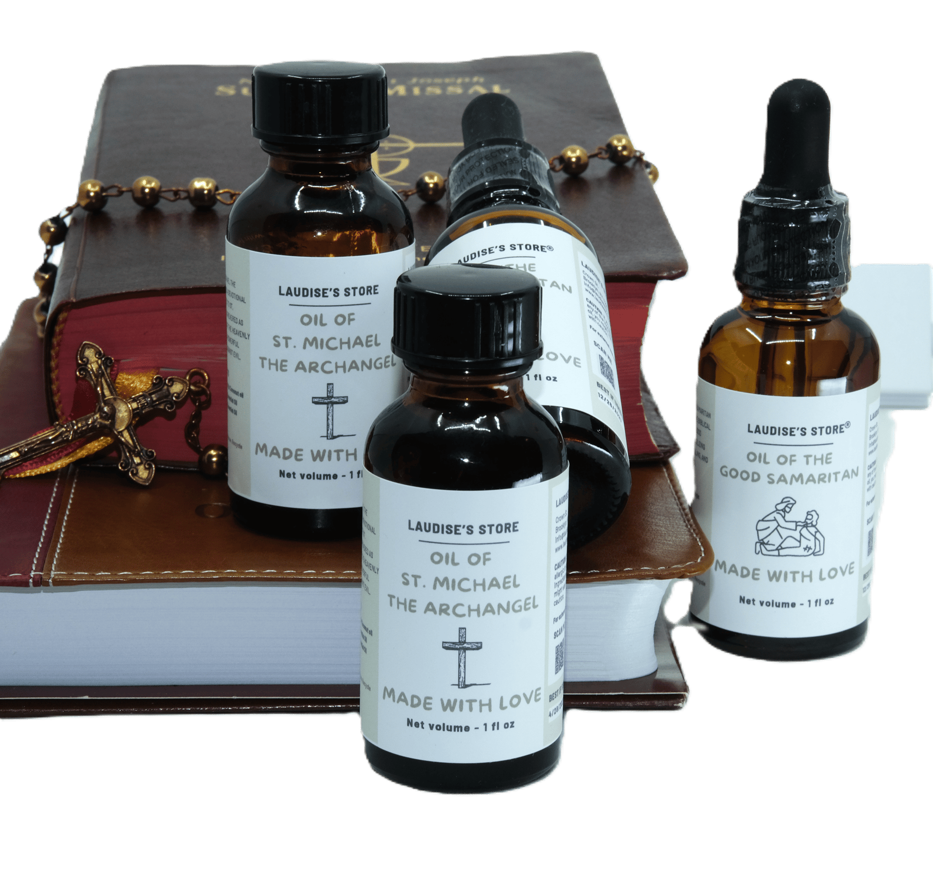 Two bottles of oil of St Michael the Archangel, standing next to a statue of Jesus