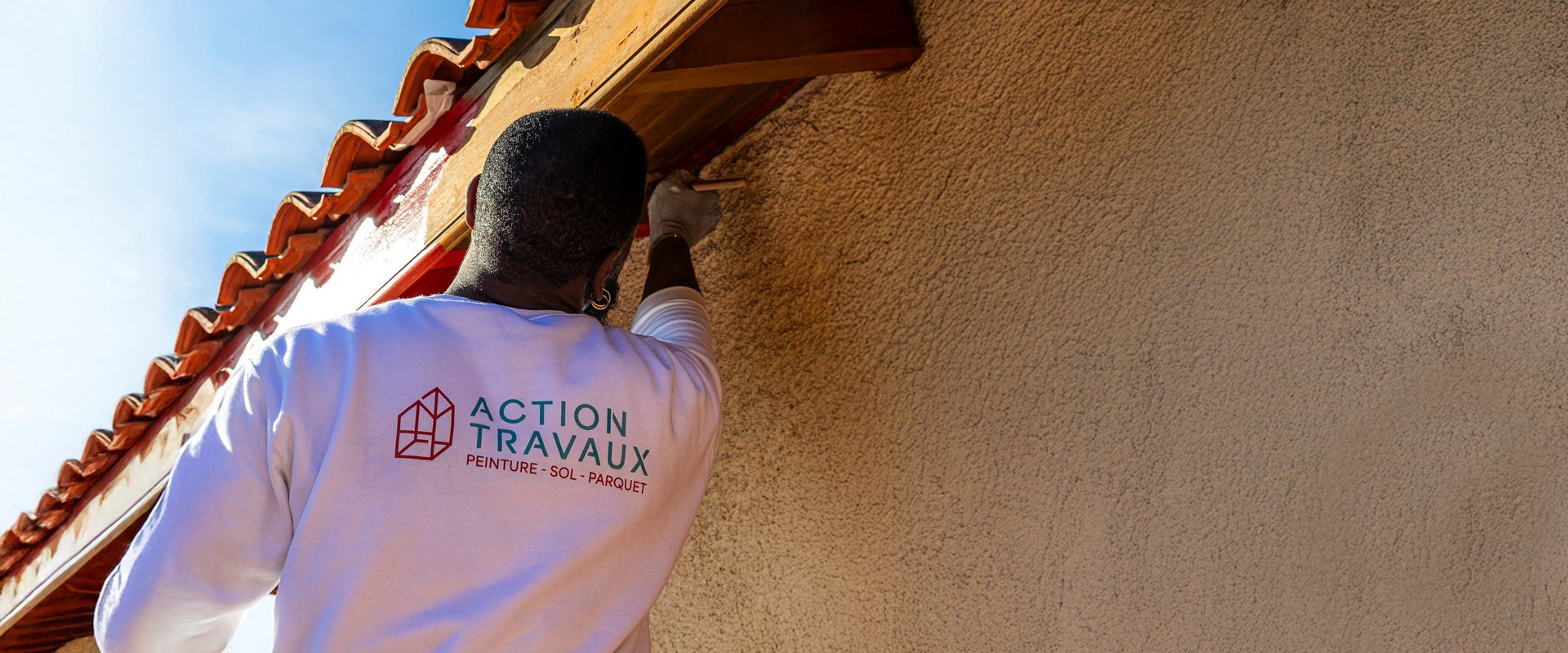 an abstract photo of a curved building with a blue sky in the background