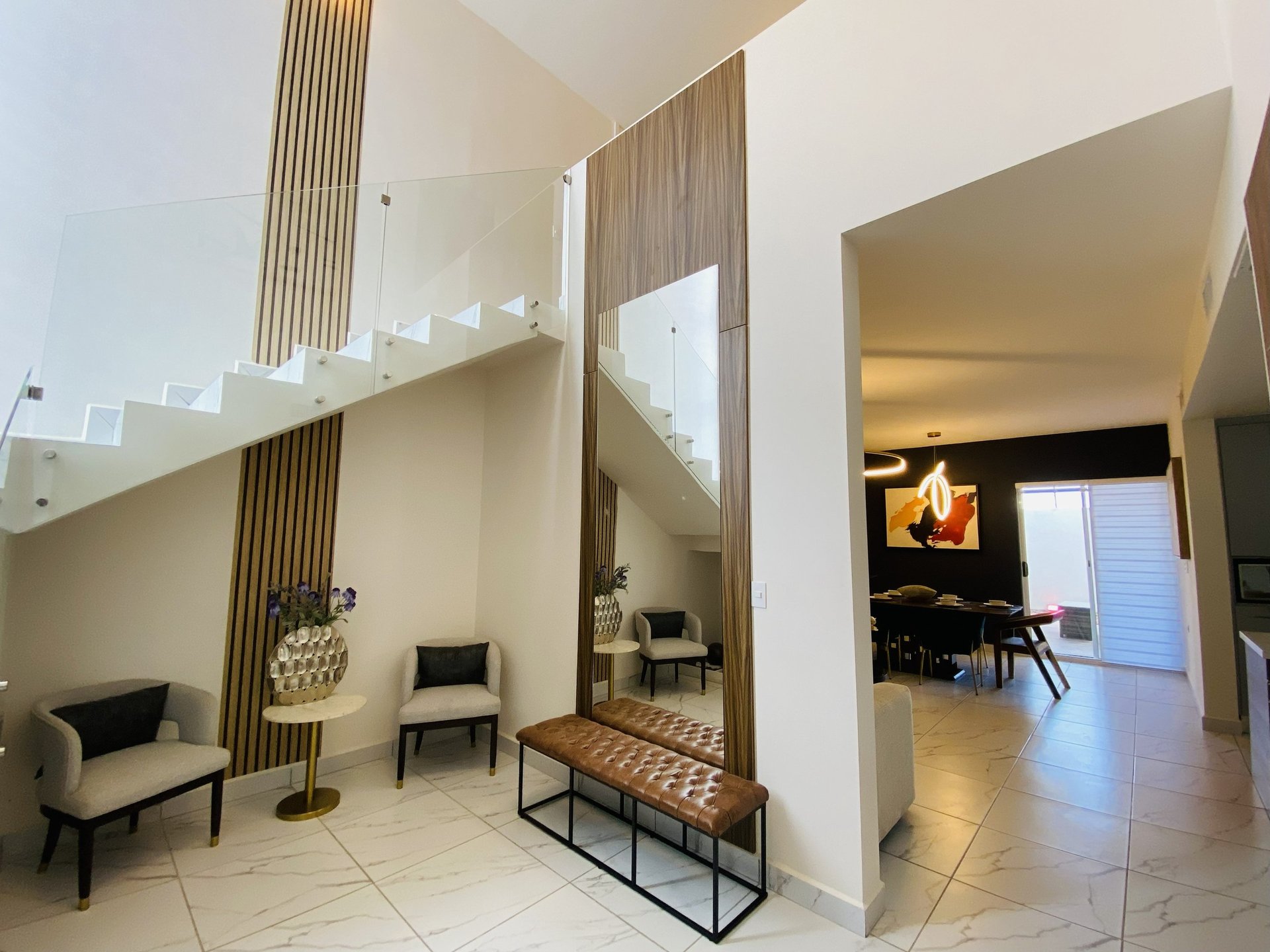 woman wearing yellow long-sleeved dress under white clouds and blue sky during daytime