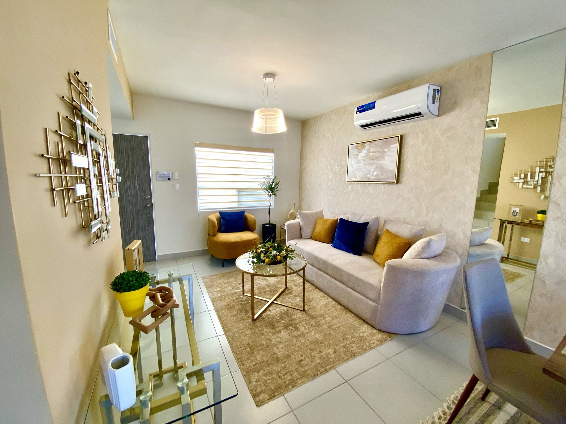 woman wearing yellow long-sleeved dress under white clouds and blue sky during daytime