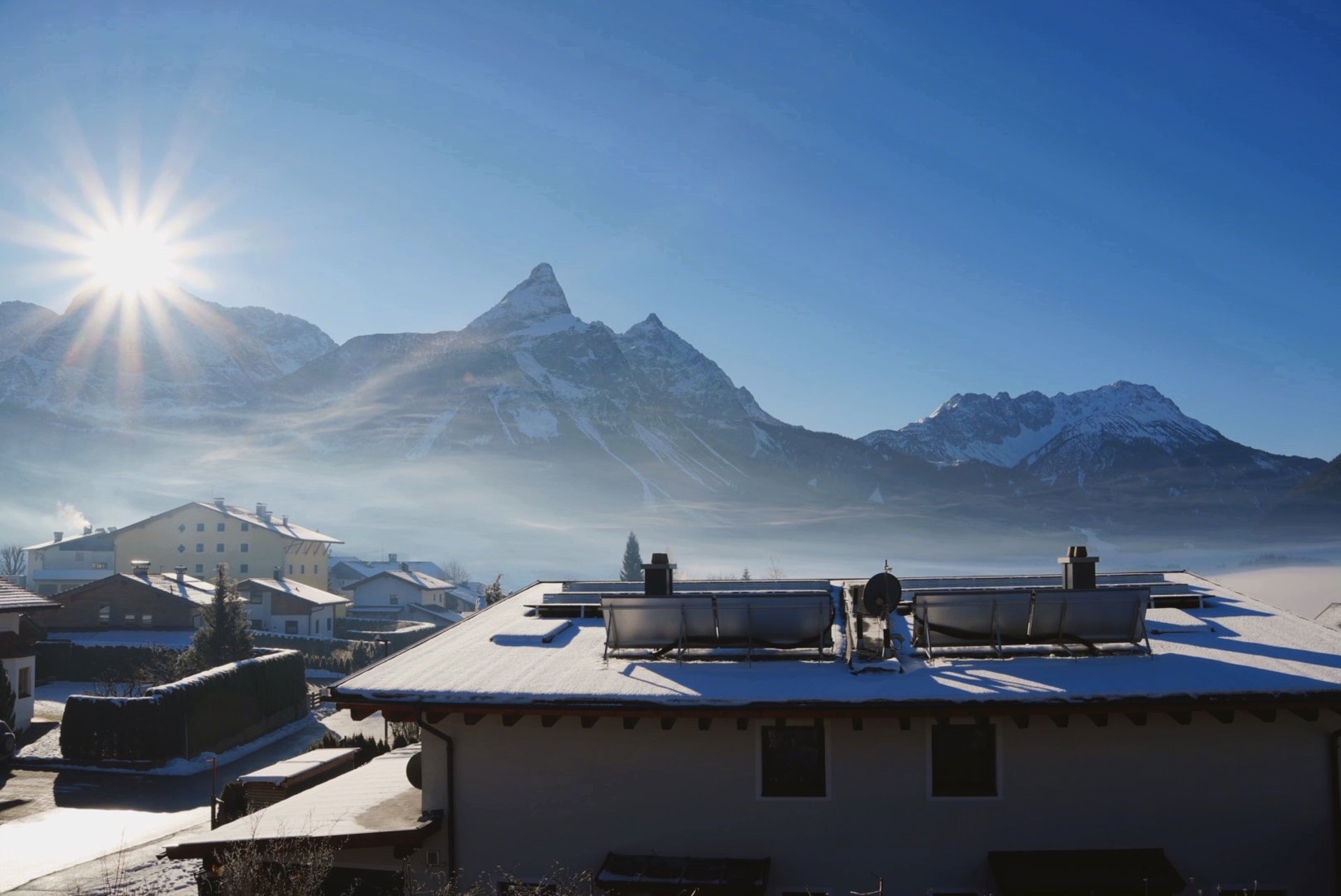 woman wearing yellow long-sleeved dress under white clouds and blue sky during daytime