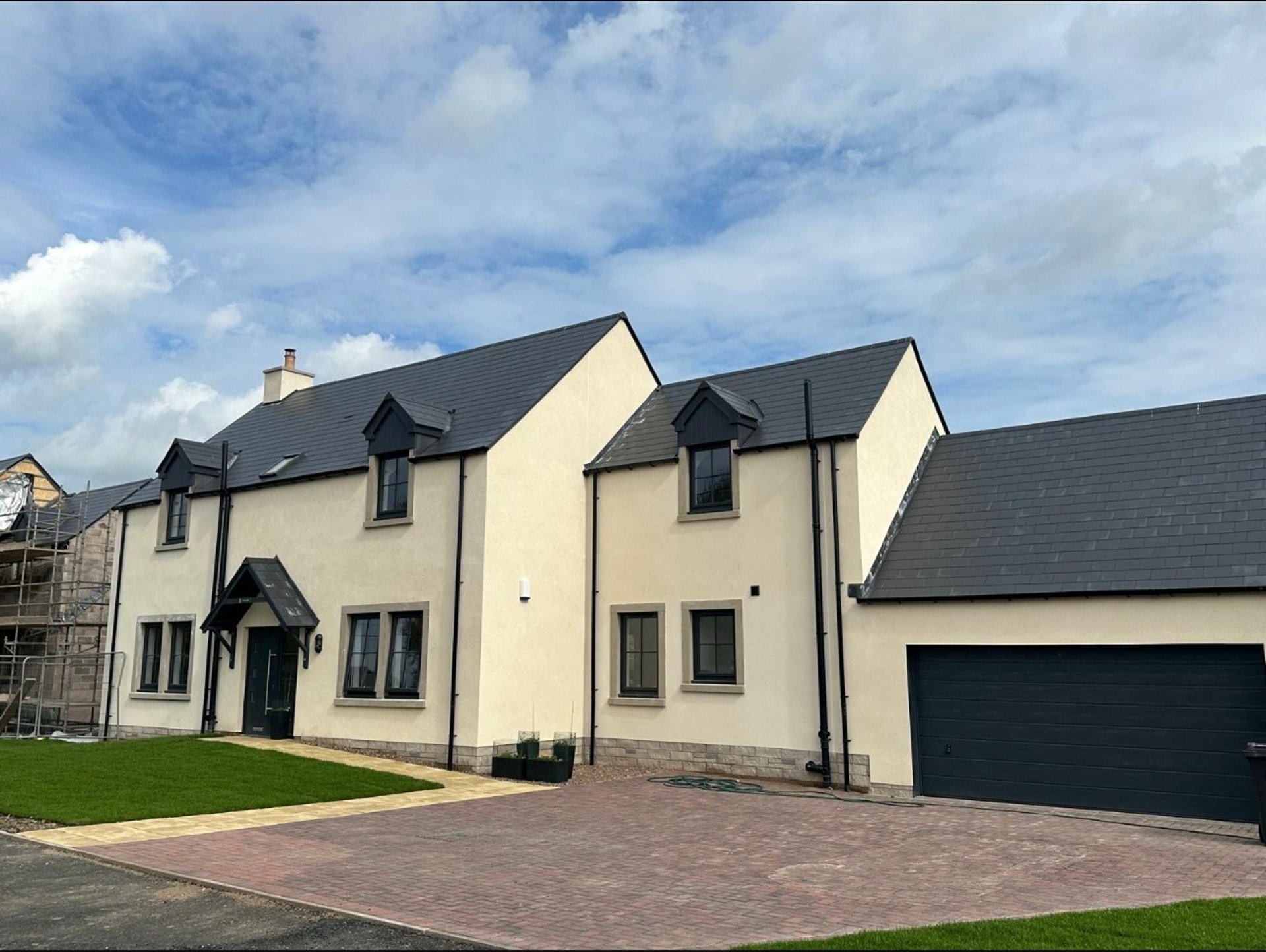 black and brown leather padded tub sofa