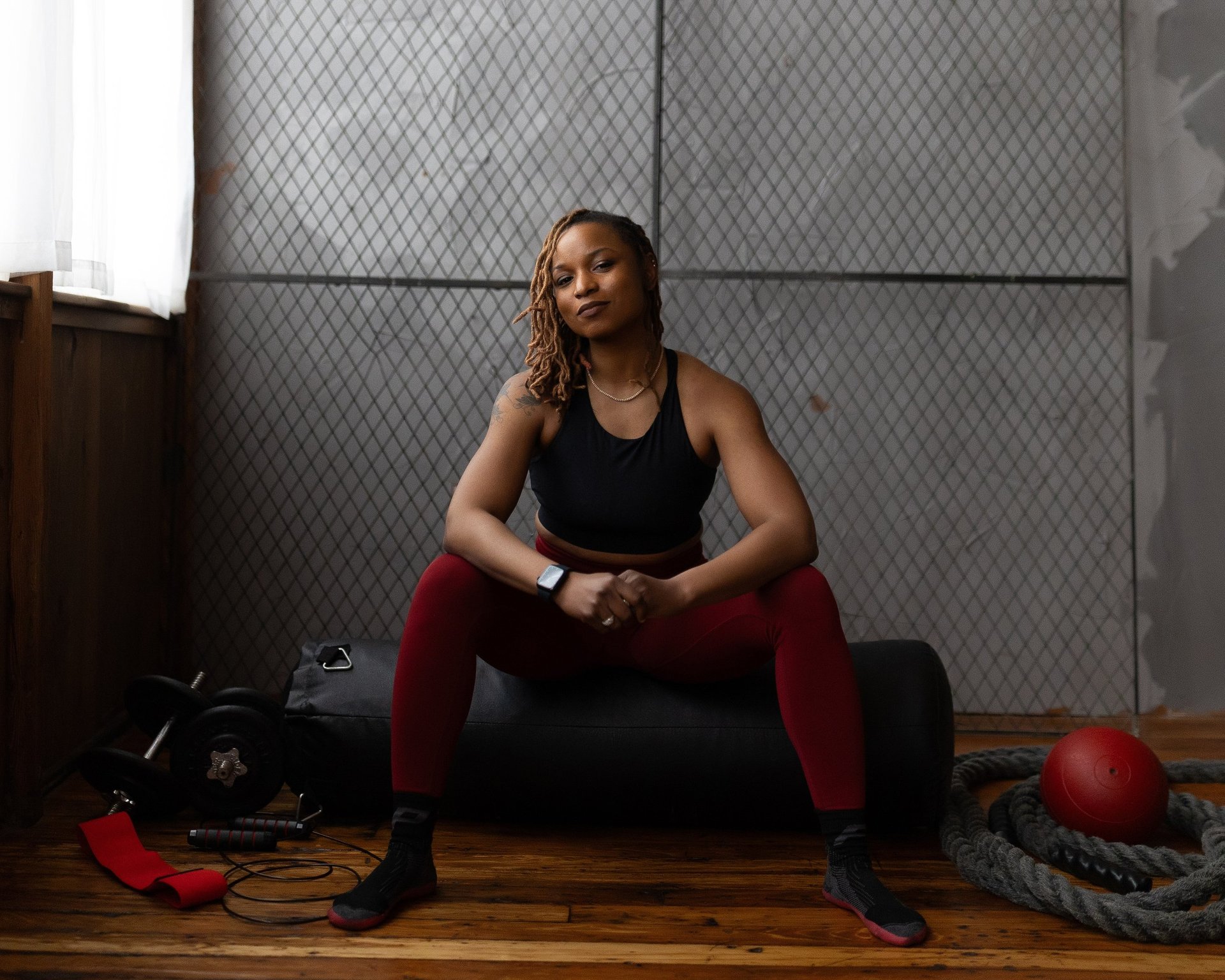 black and brown leather padded tub sofa