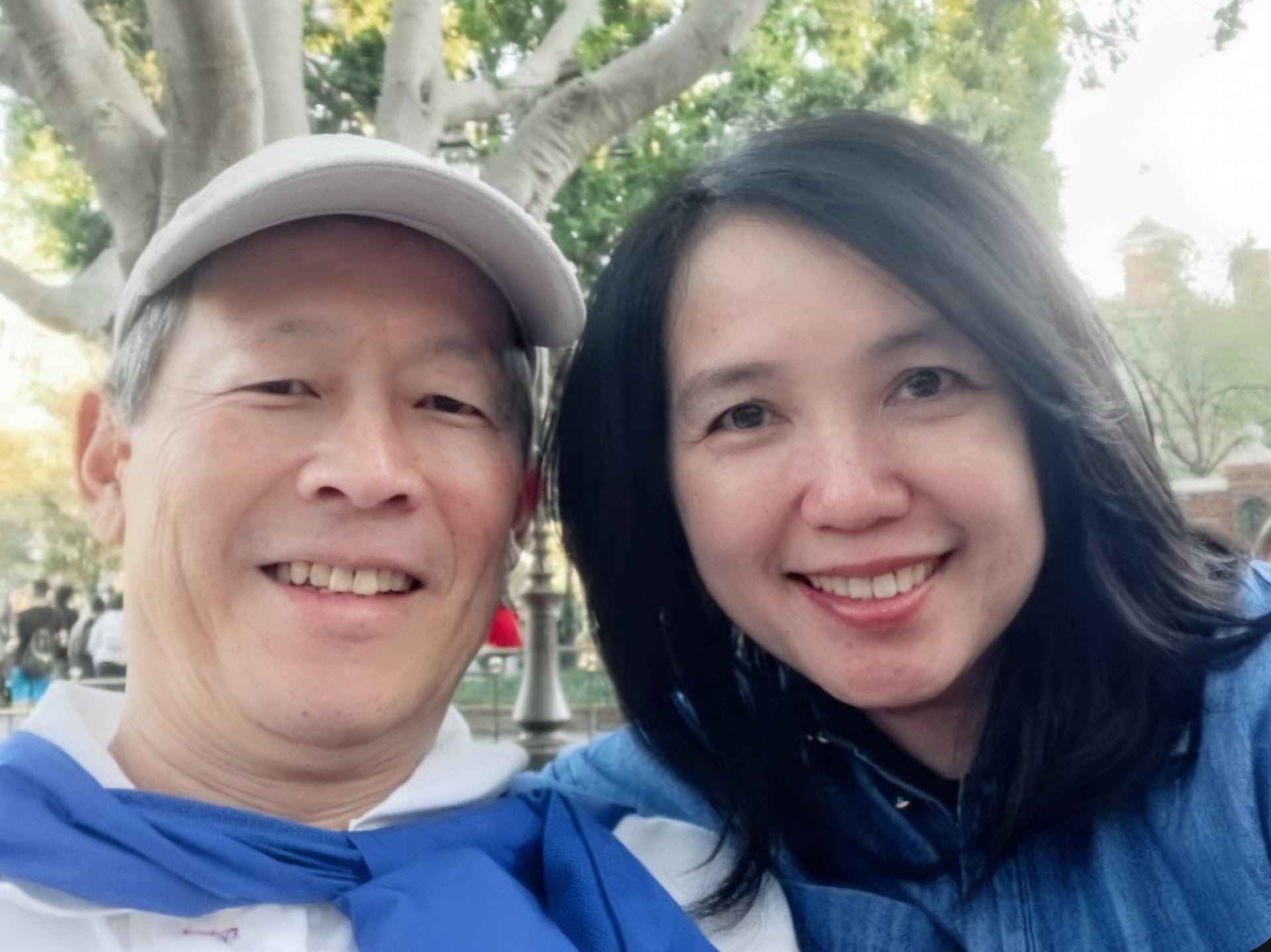 couple wearing silver-colored rings