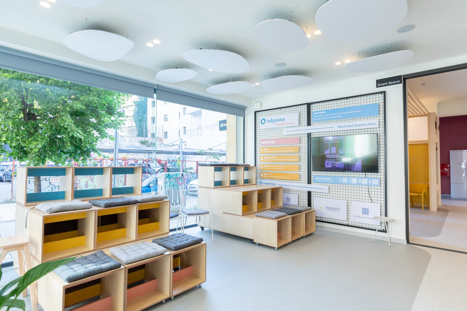 an abstract photo of a curved building with a blue sky in the background