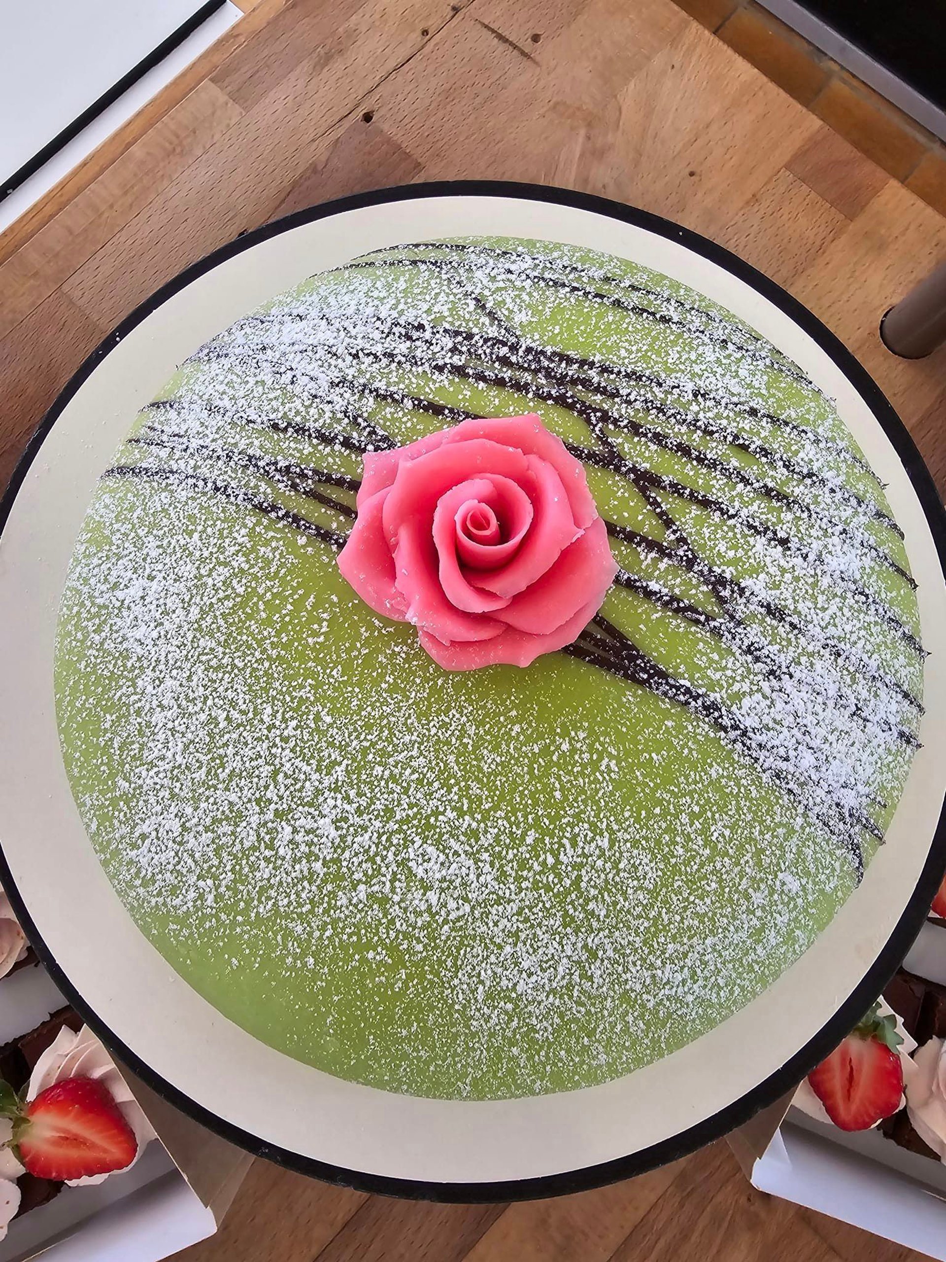 an abstract photo of a curved building with a blue sky in the background