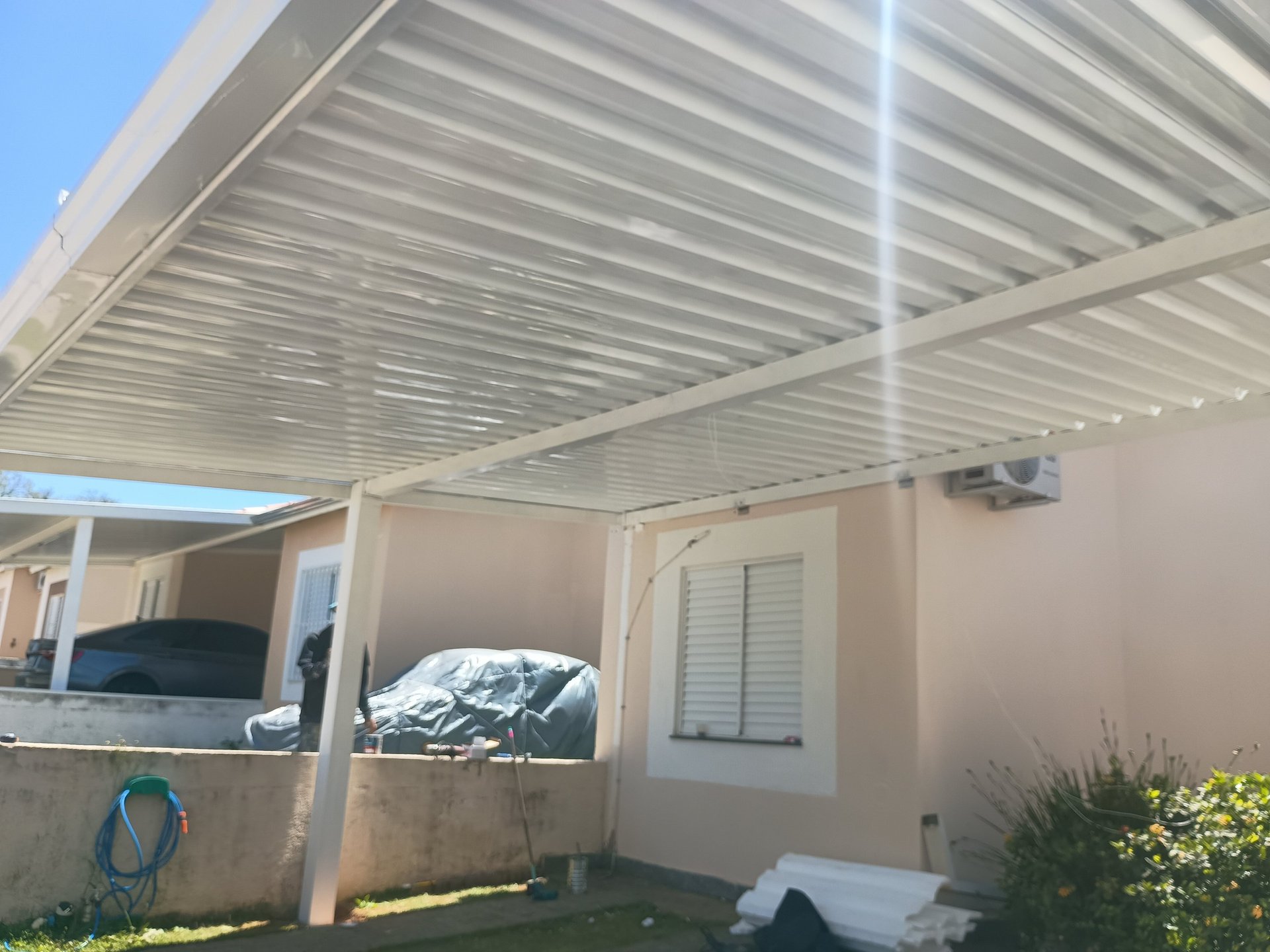 woman wearing yellow long-sleeved dress under white clouds and blue sky during daytime