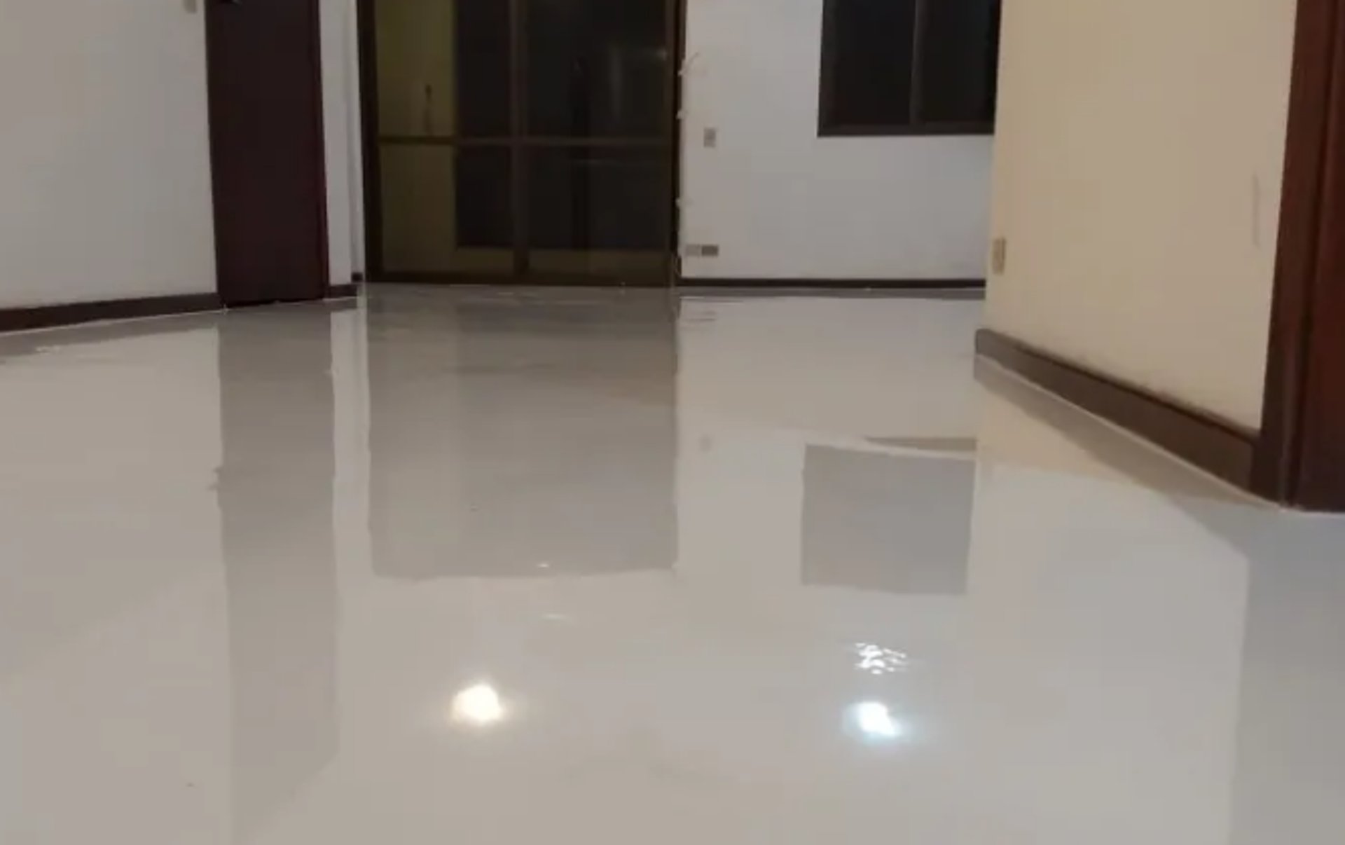 white security camera on post