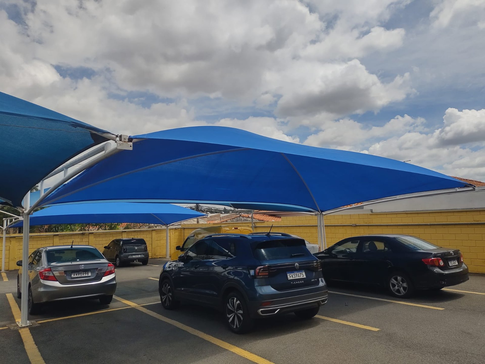 black and brown leather padded tub sofa