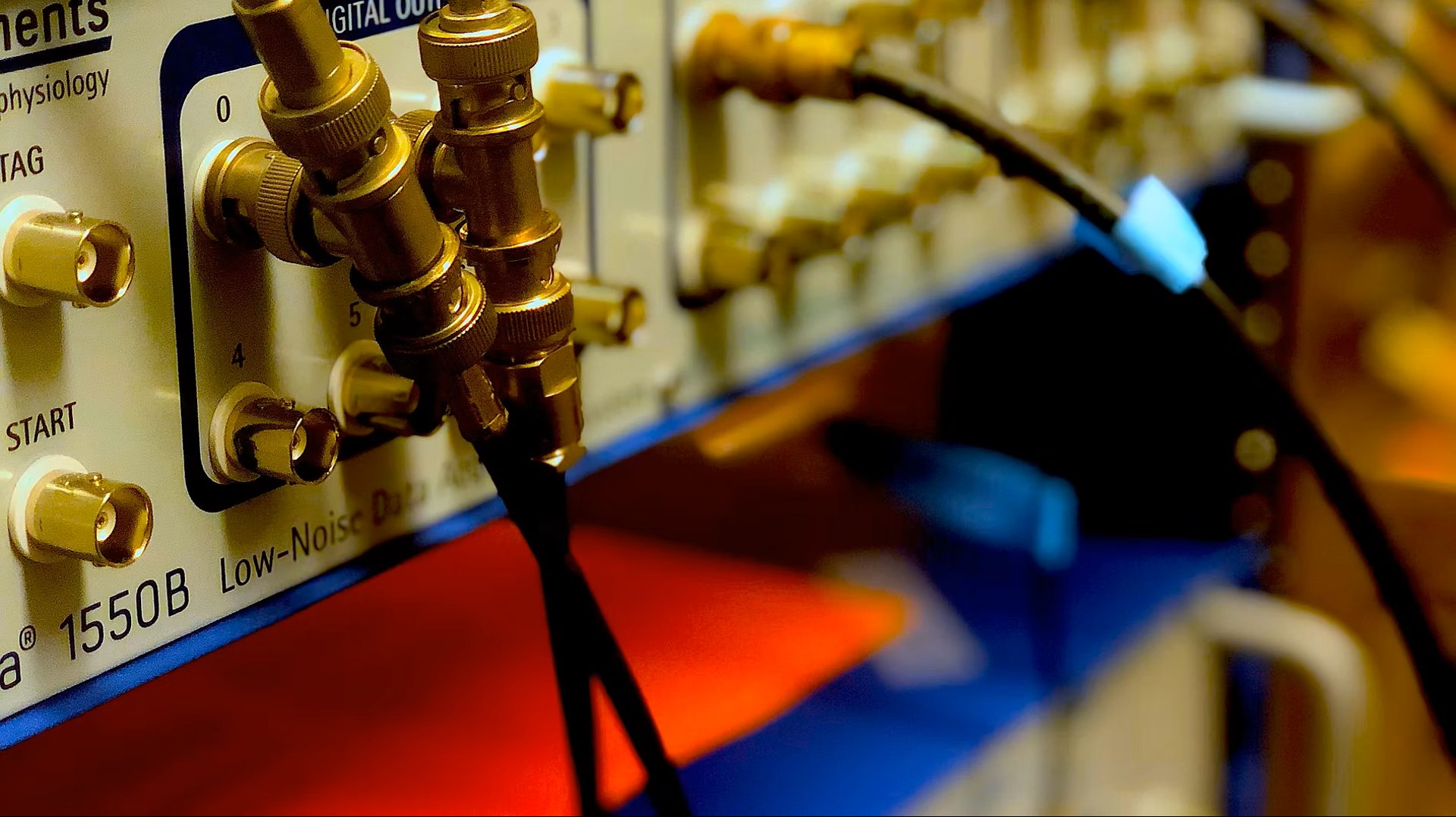 a clock tower with a cross on top of it
