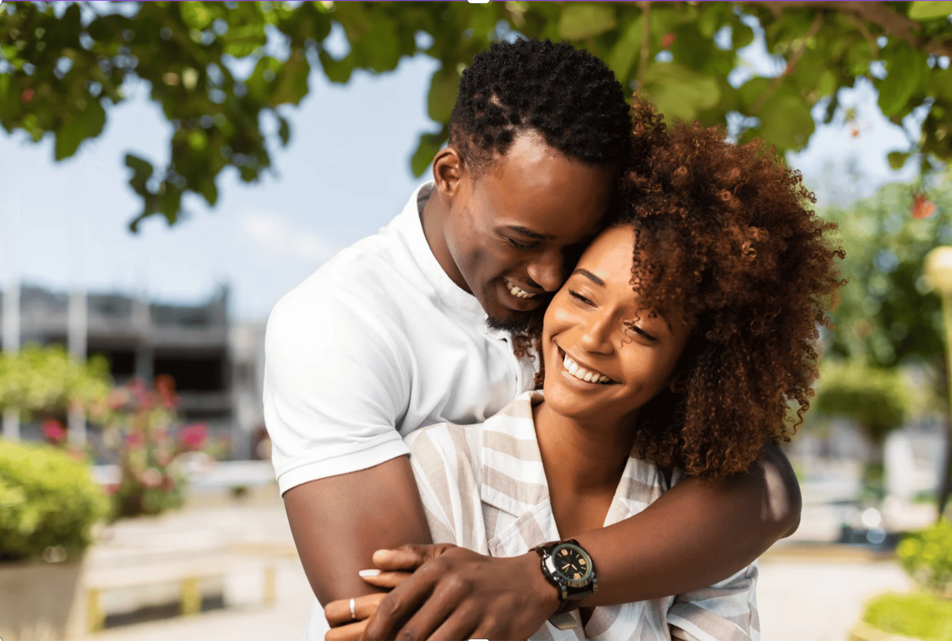 an abstract photo of a curved building with a blue sky in the background