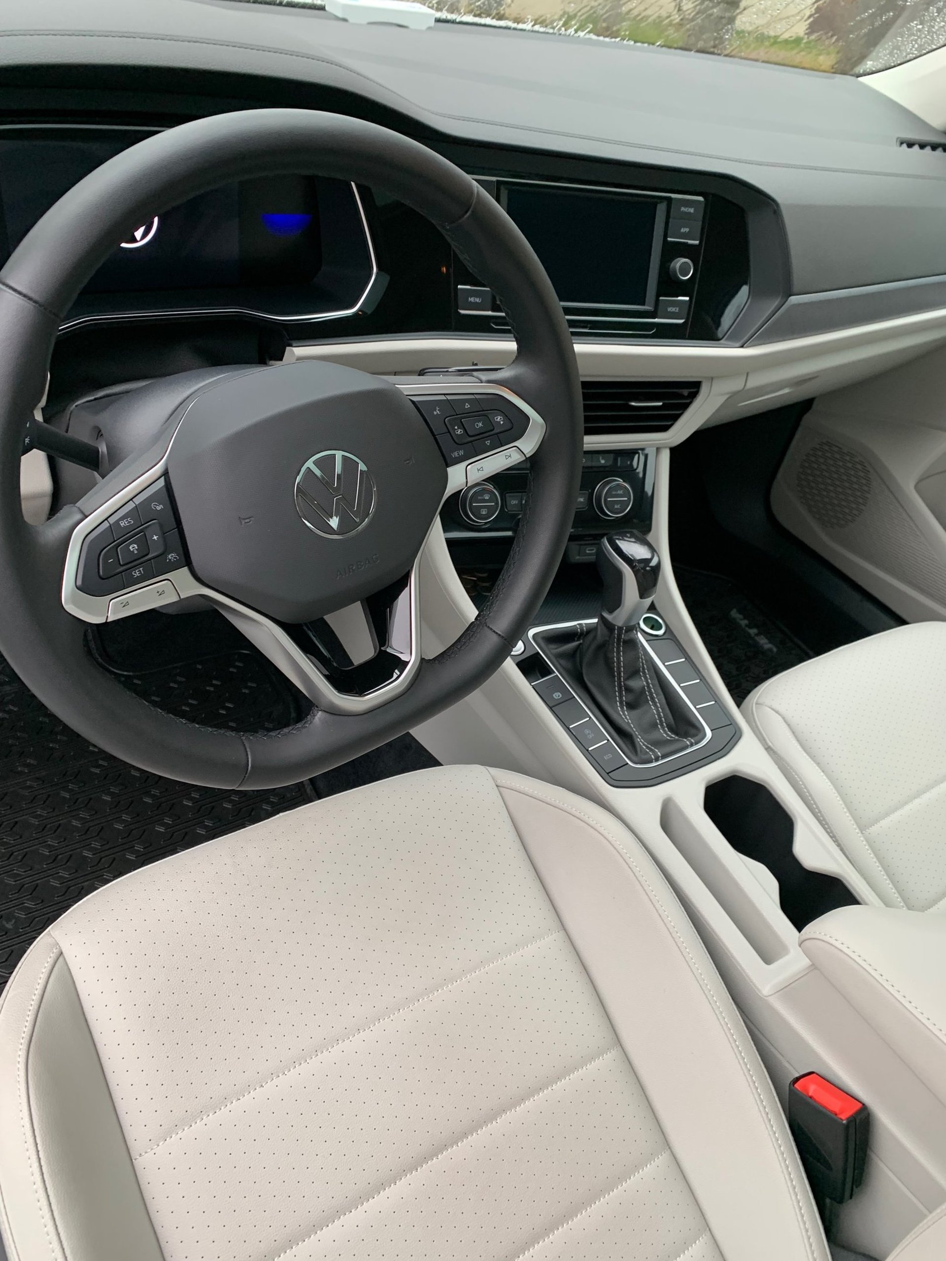 black and brown leather padded tub sofa