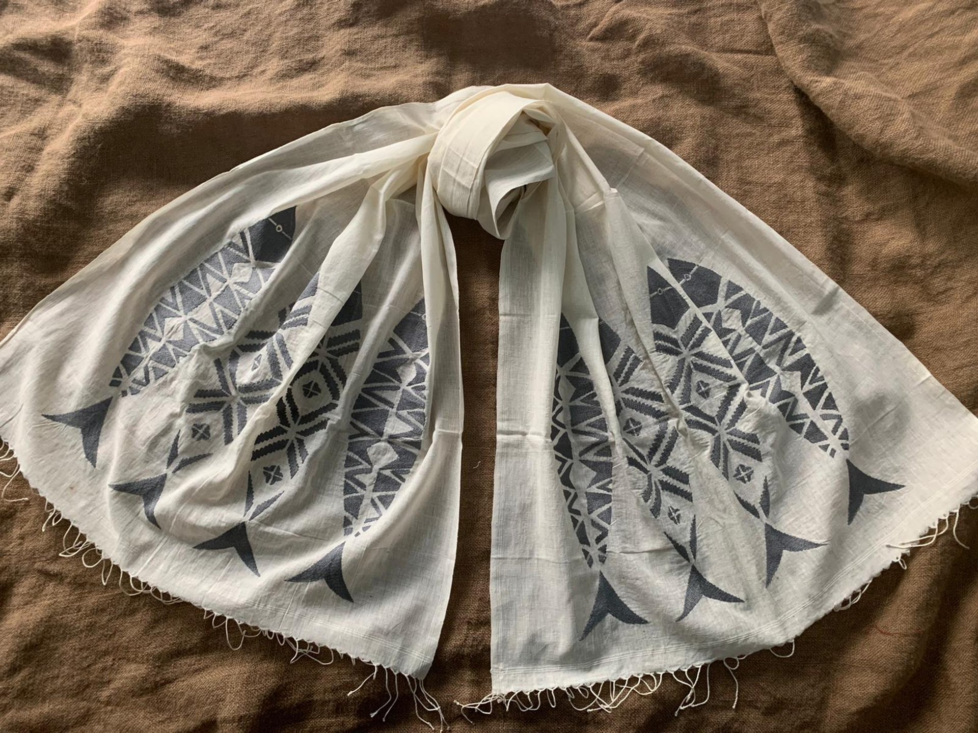 woman holding dried flower