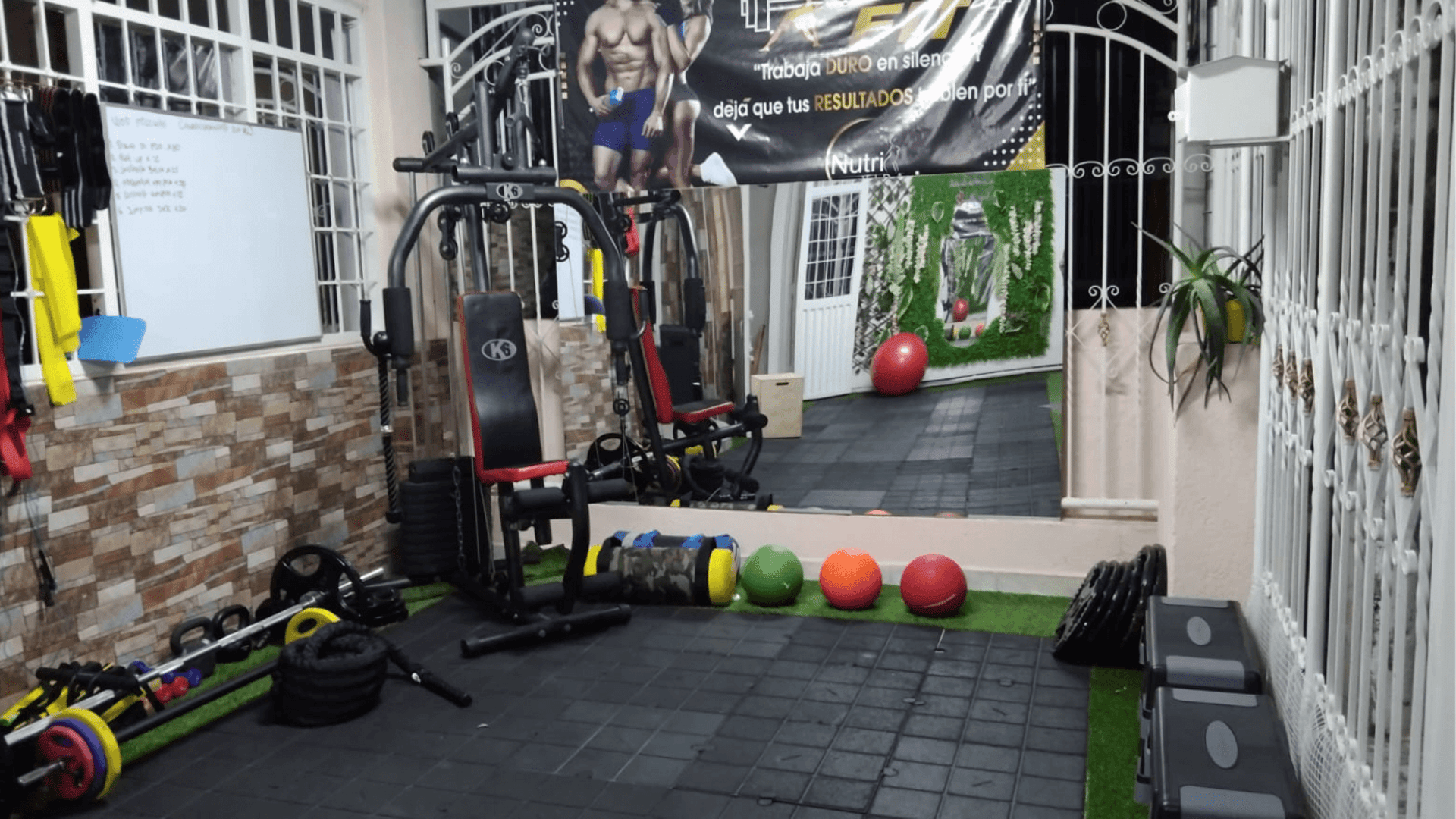 an abstract photo of a curved building with a blue sky in the background