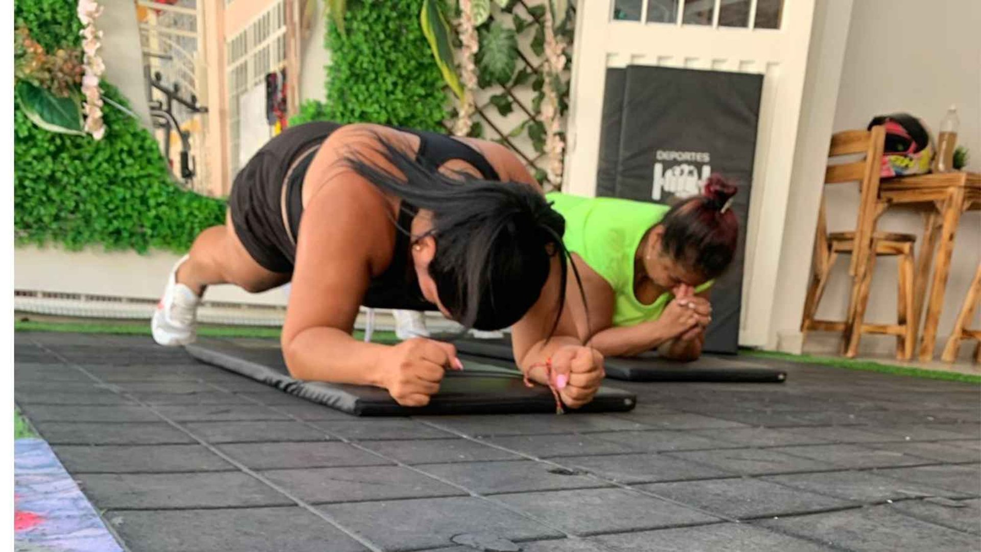 an abstract photo of a curved building with a blue sky in the background