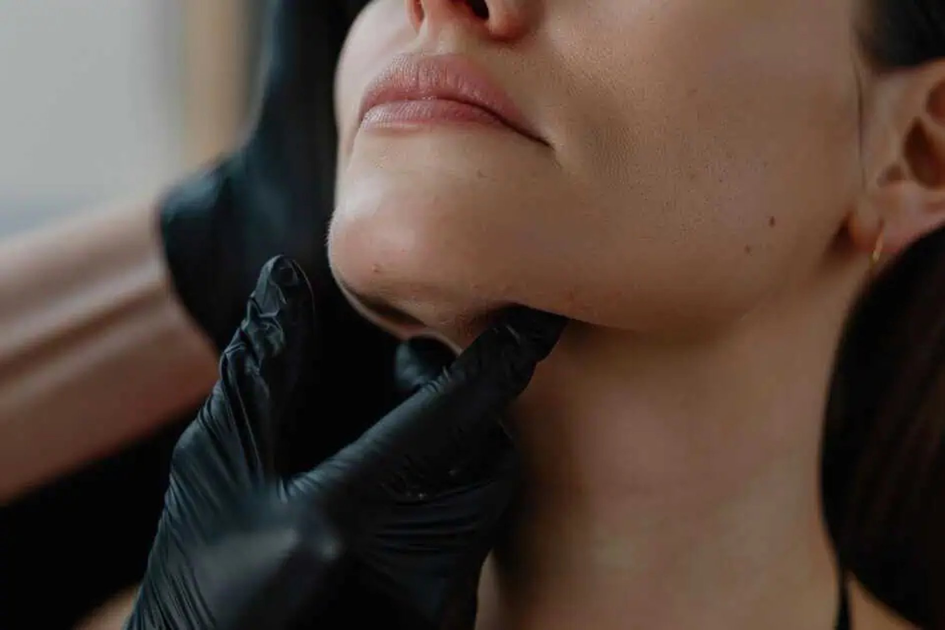 person fixing someone's face