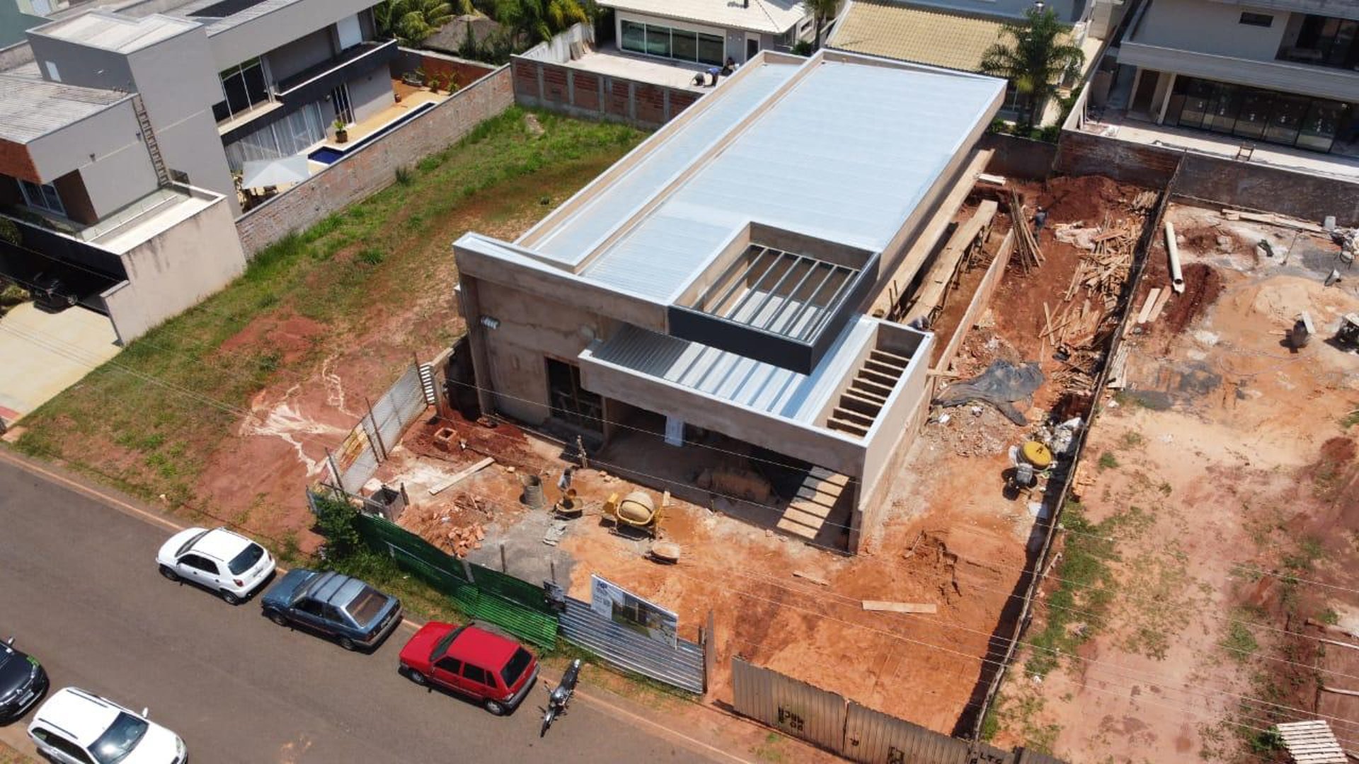 woman wearing yellow long-sleeved dress under white clouds and blue sky during daytime
