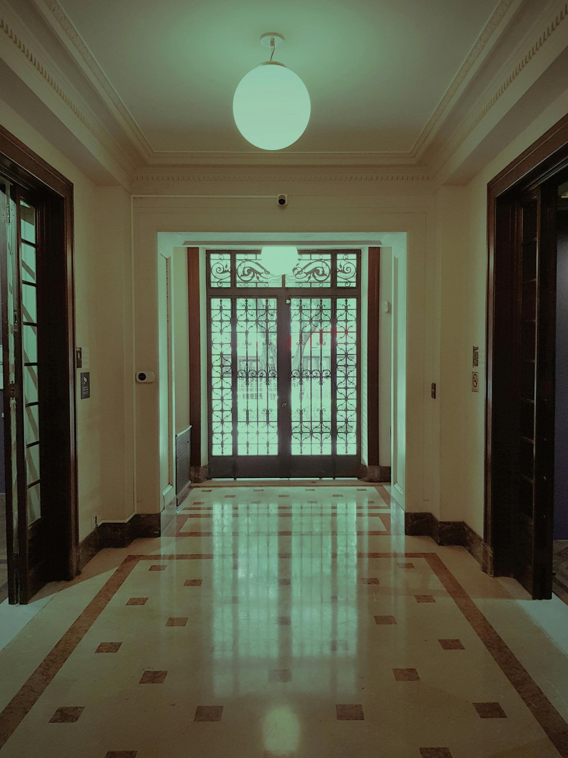 black and brown leather padded tub sofa