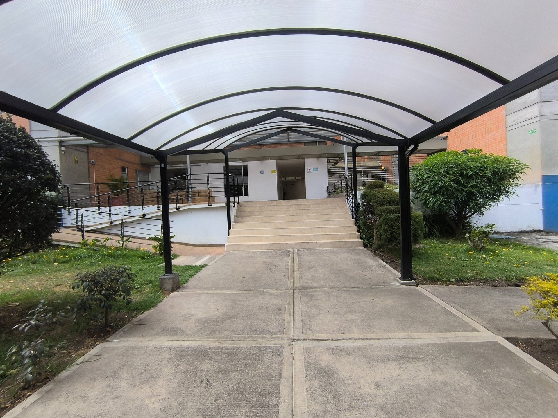 black and brown leather padded tub sofa