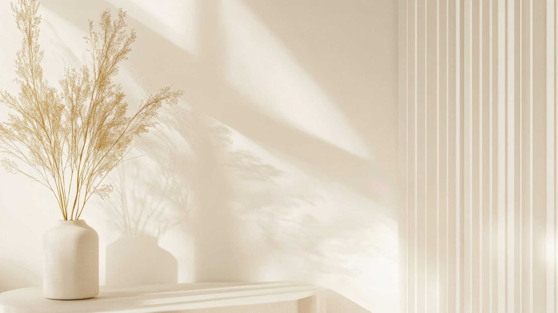 a blue chair and a yellow lamp in a white room