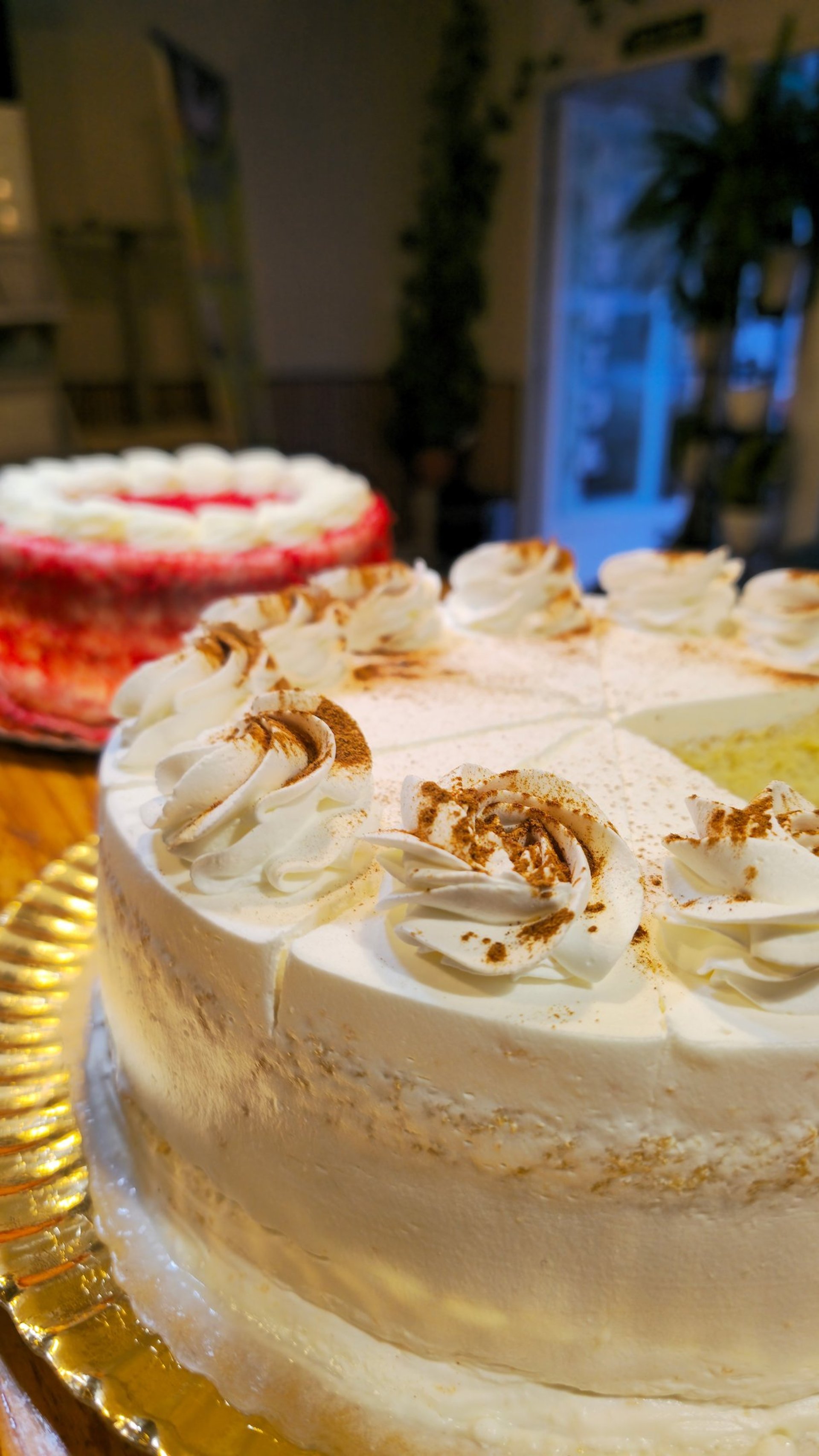 woman wearing yellow long-sleeved dress under white clouds and blue sky during daytime