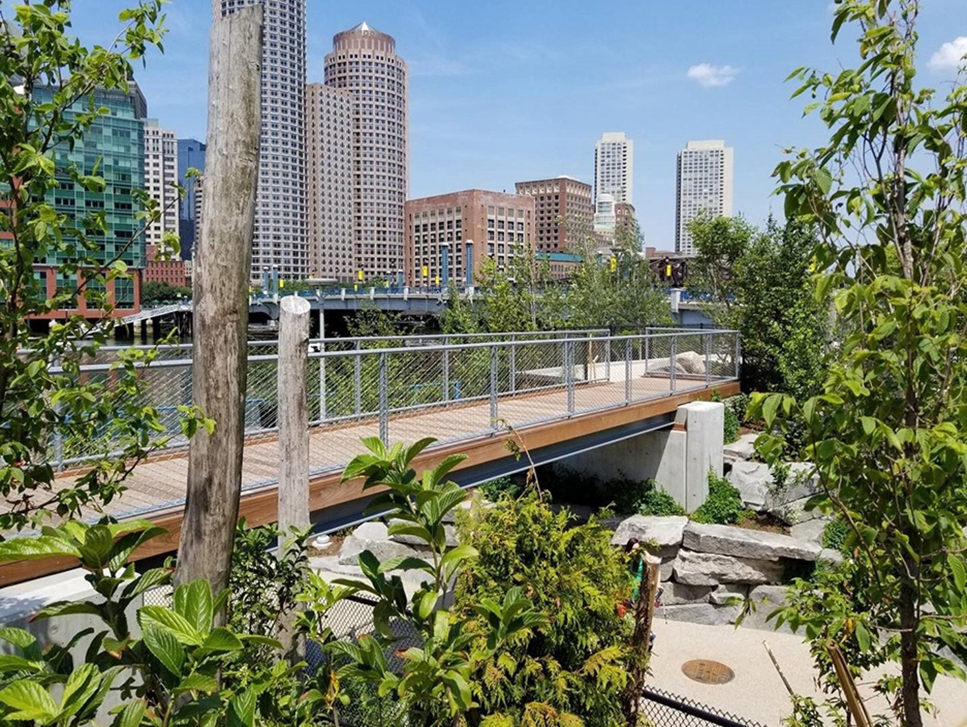 an abstract photo of a curved building with a blue sky in the background