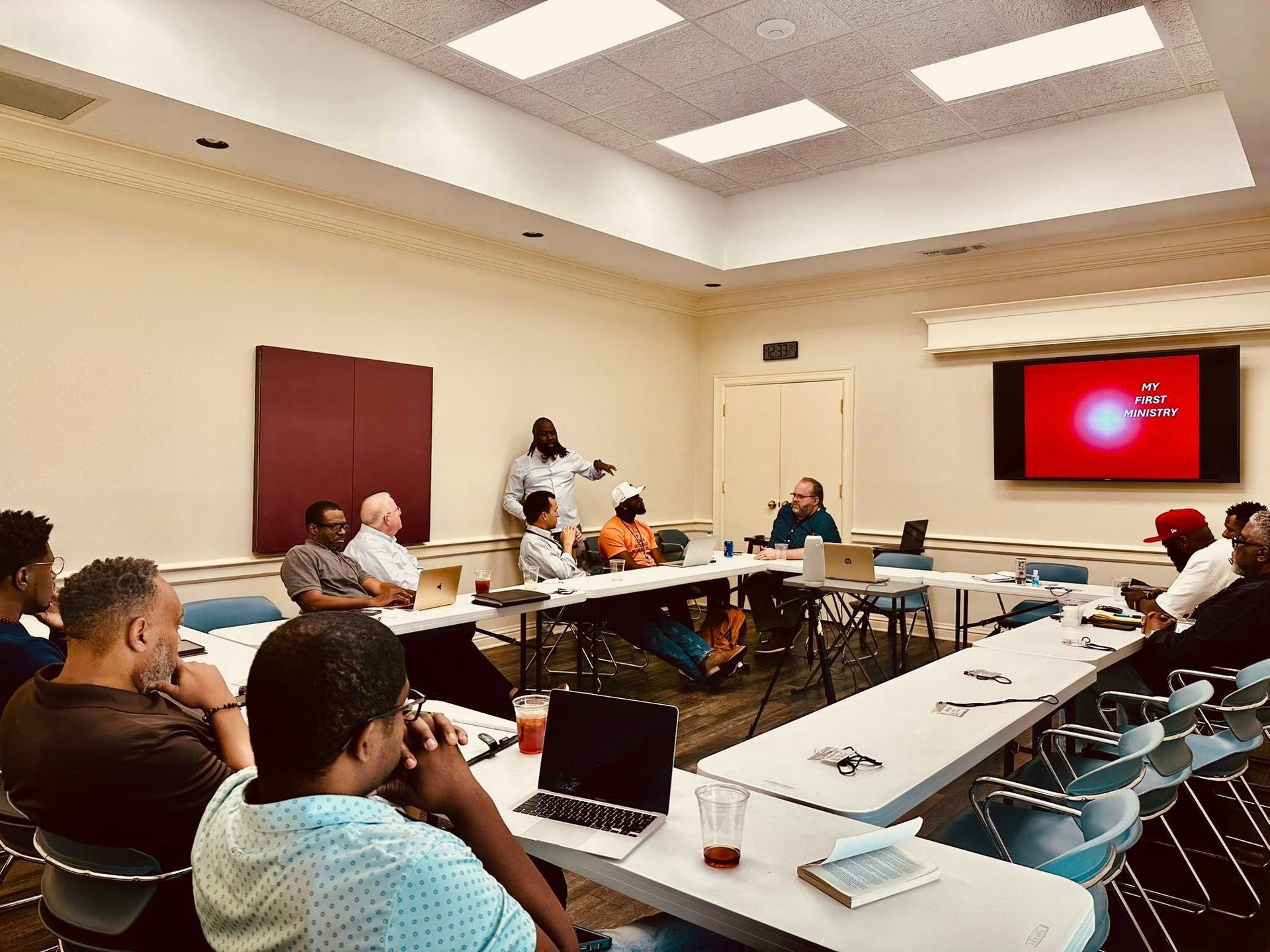 an abstract photo of a curved building with a blue sky in the background