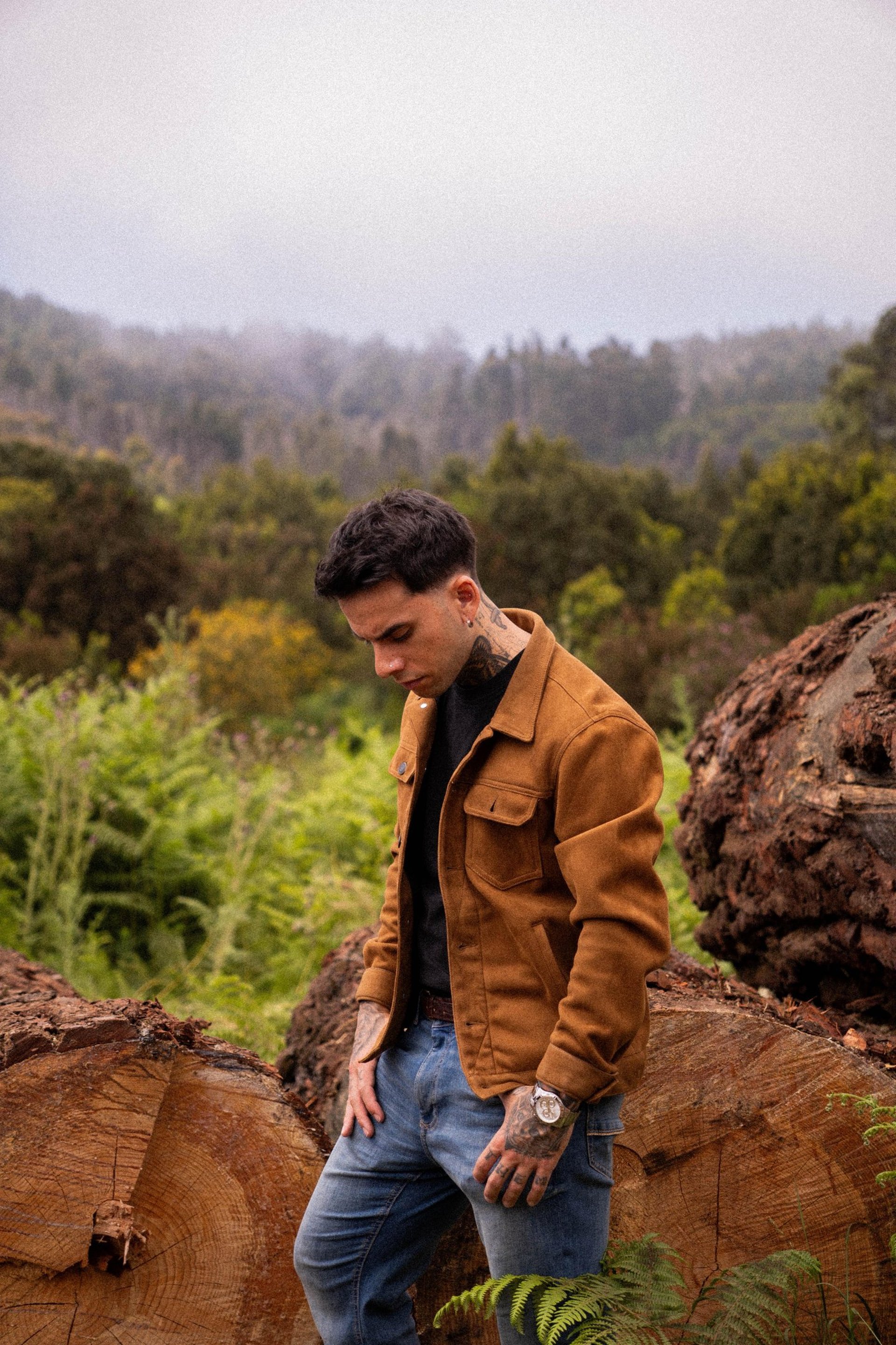 black and brown leather padded tub sofa