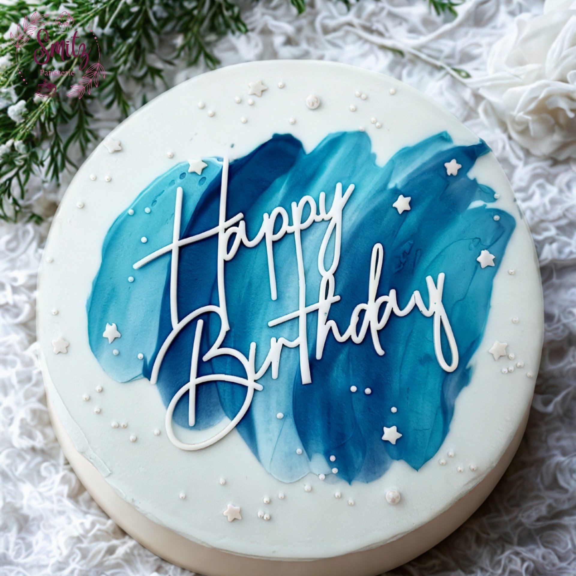 white cake with chocolate syrup on white ceramic plate