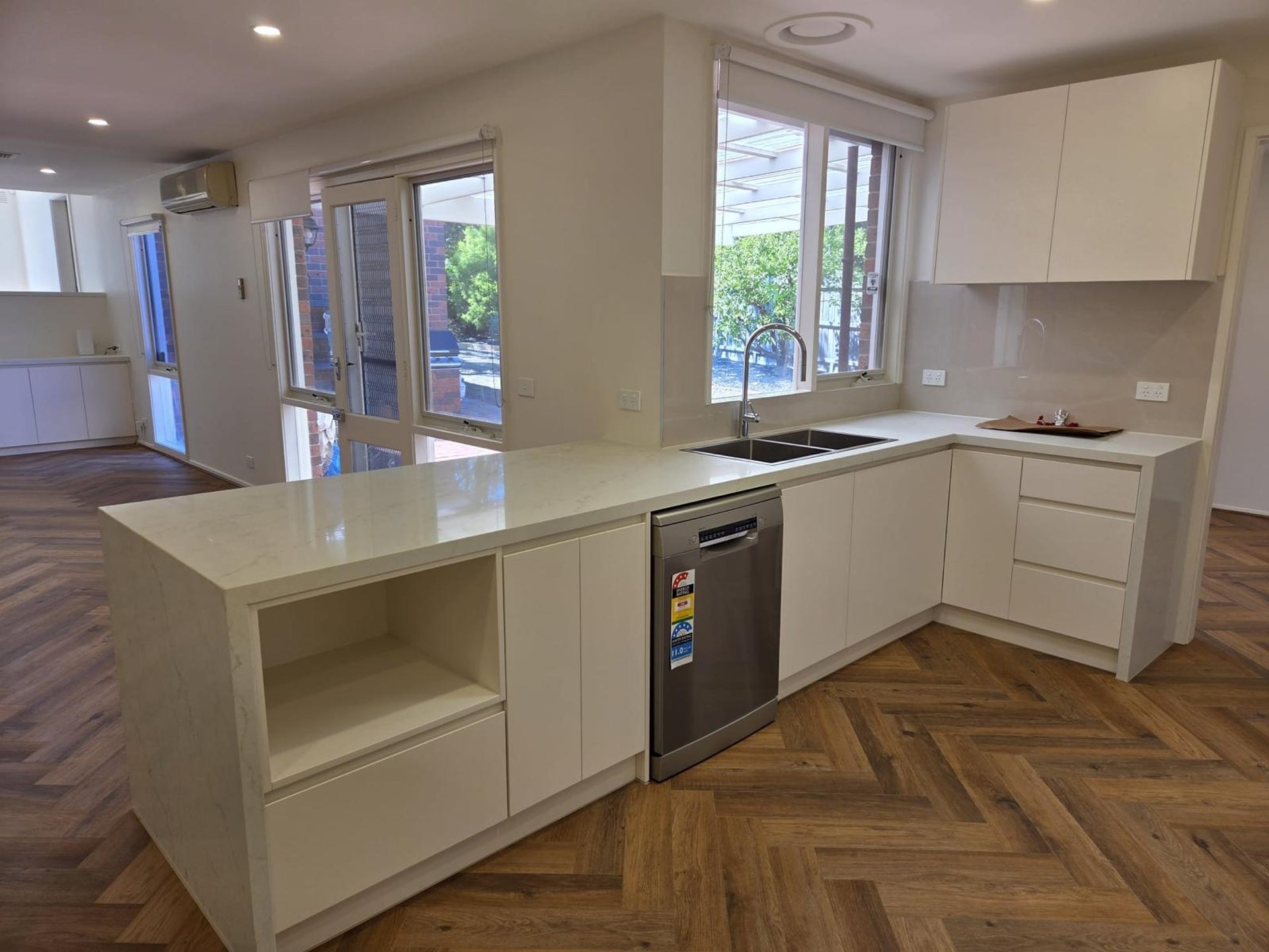 woman wearing yellow long-sleeved dress under white clouds and blue sky during daytime