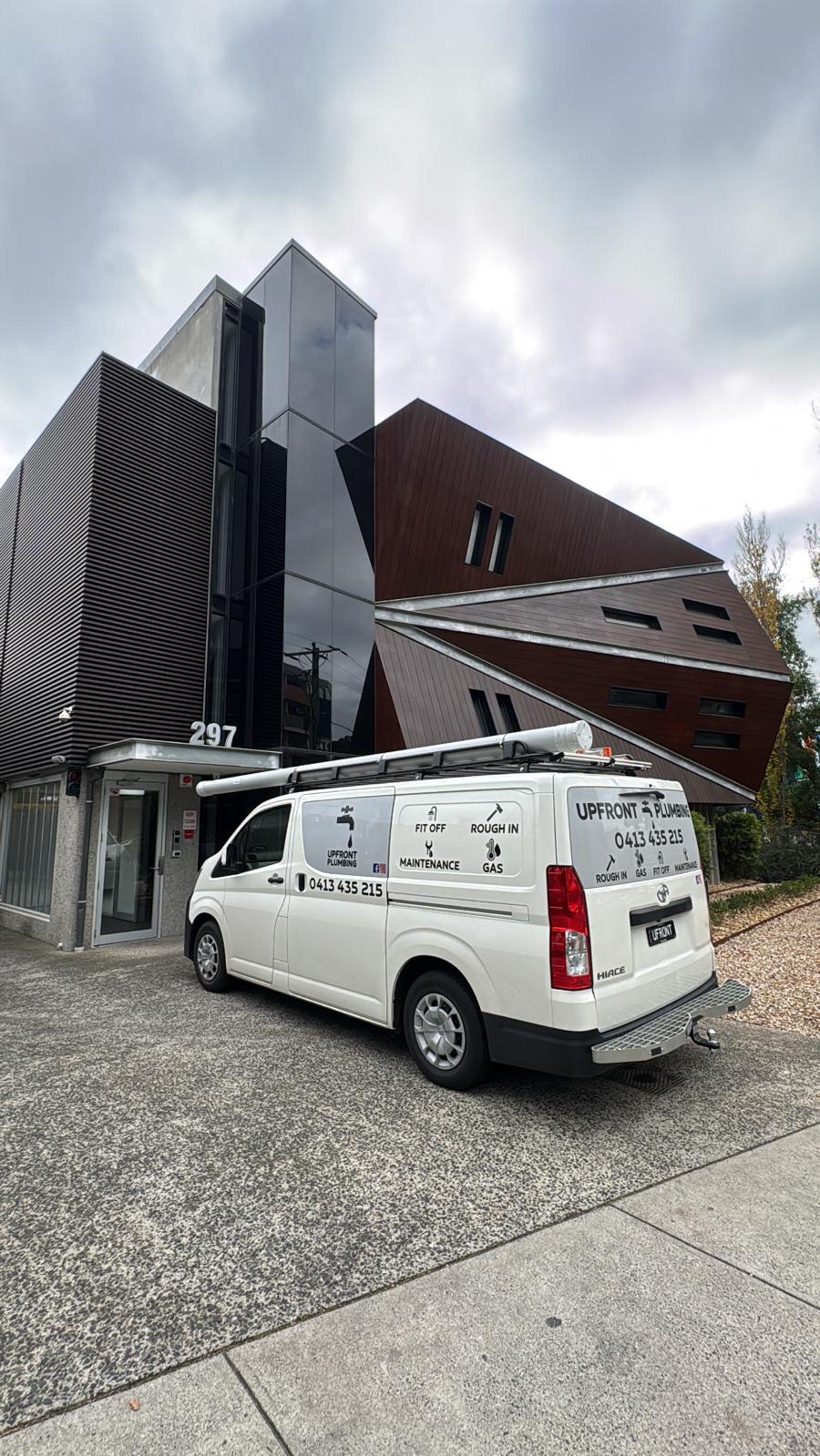 black and brown leather padded tub sofa