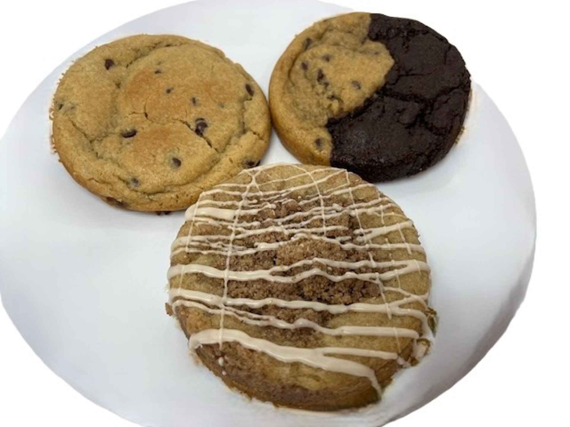 person holding brown cookies on white textile