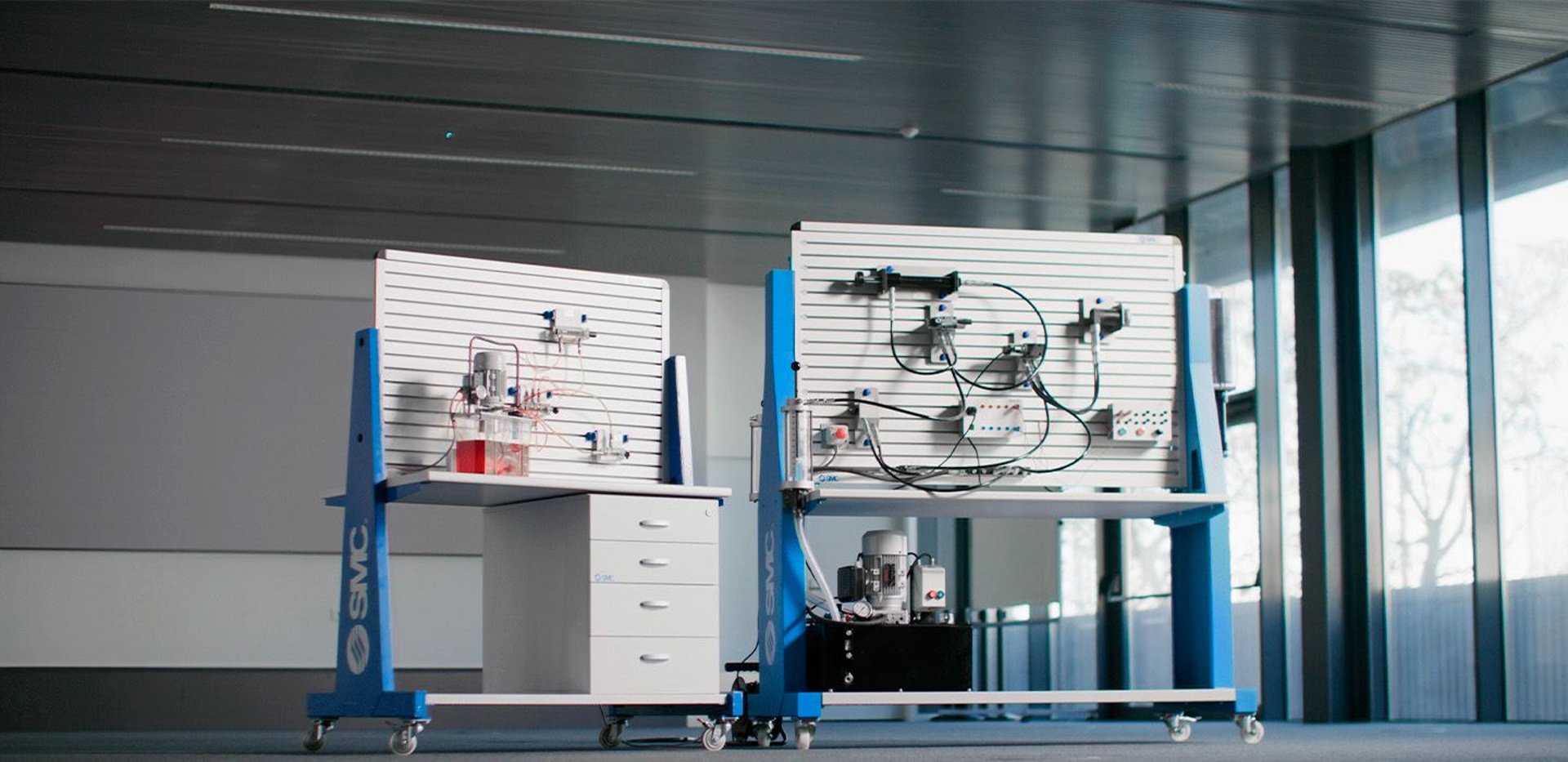an abstract photo of a curved building with a blue sky in the background