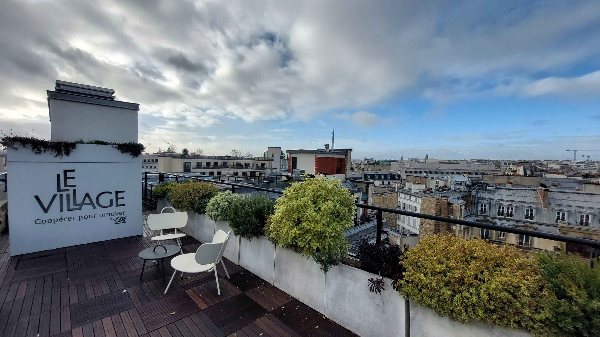 an abstract photo of a curved building with a blue sky in the background