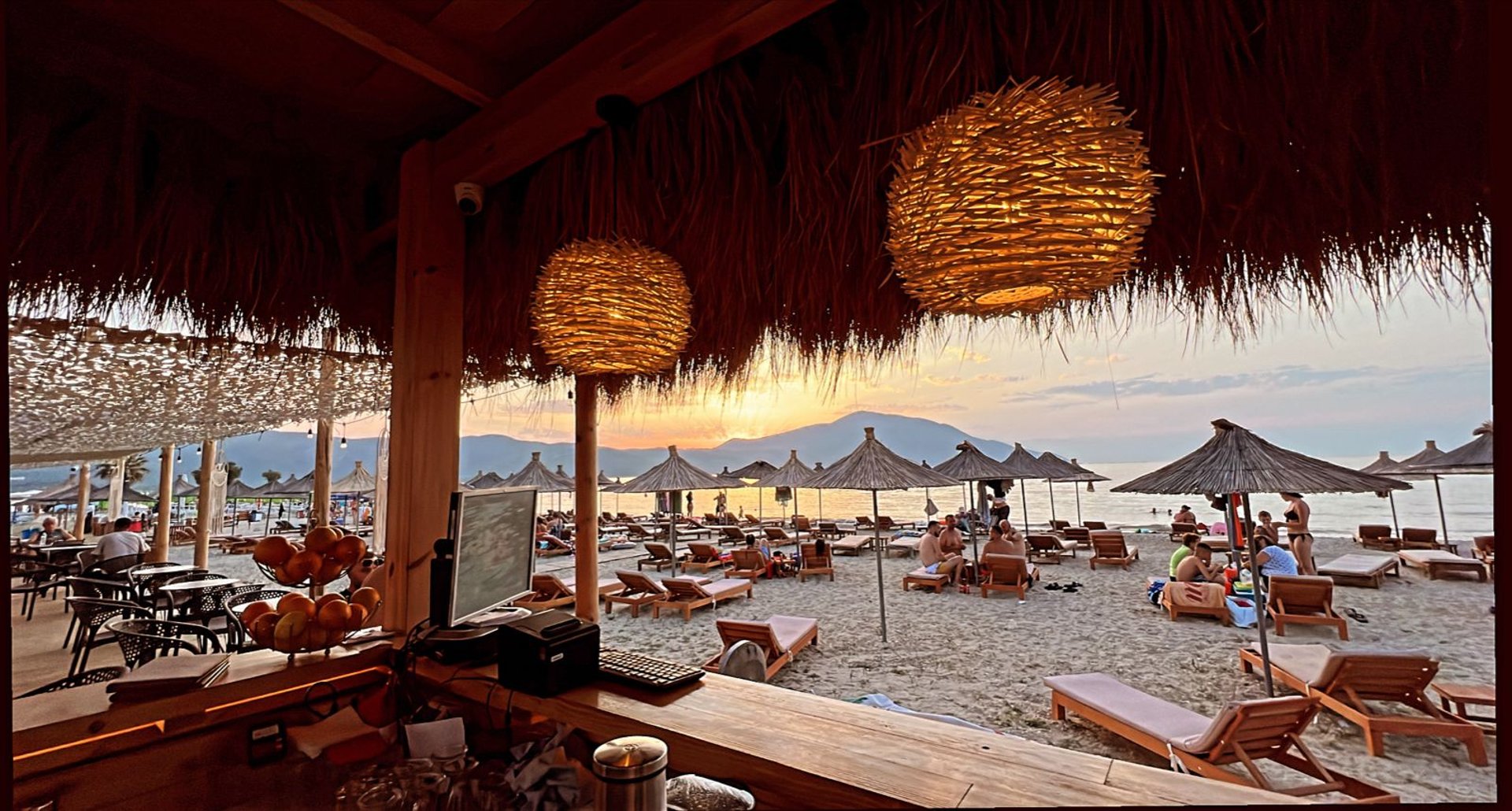woman wearing yellow long-sleeved dress under white clouds and blue sky during daytime