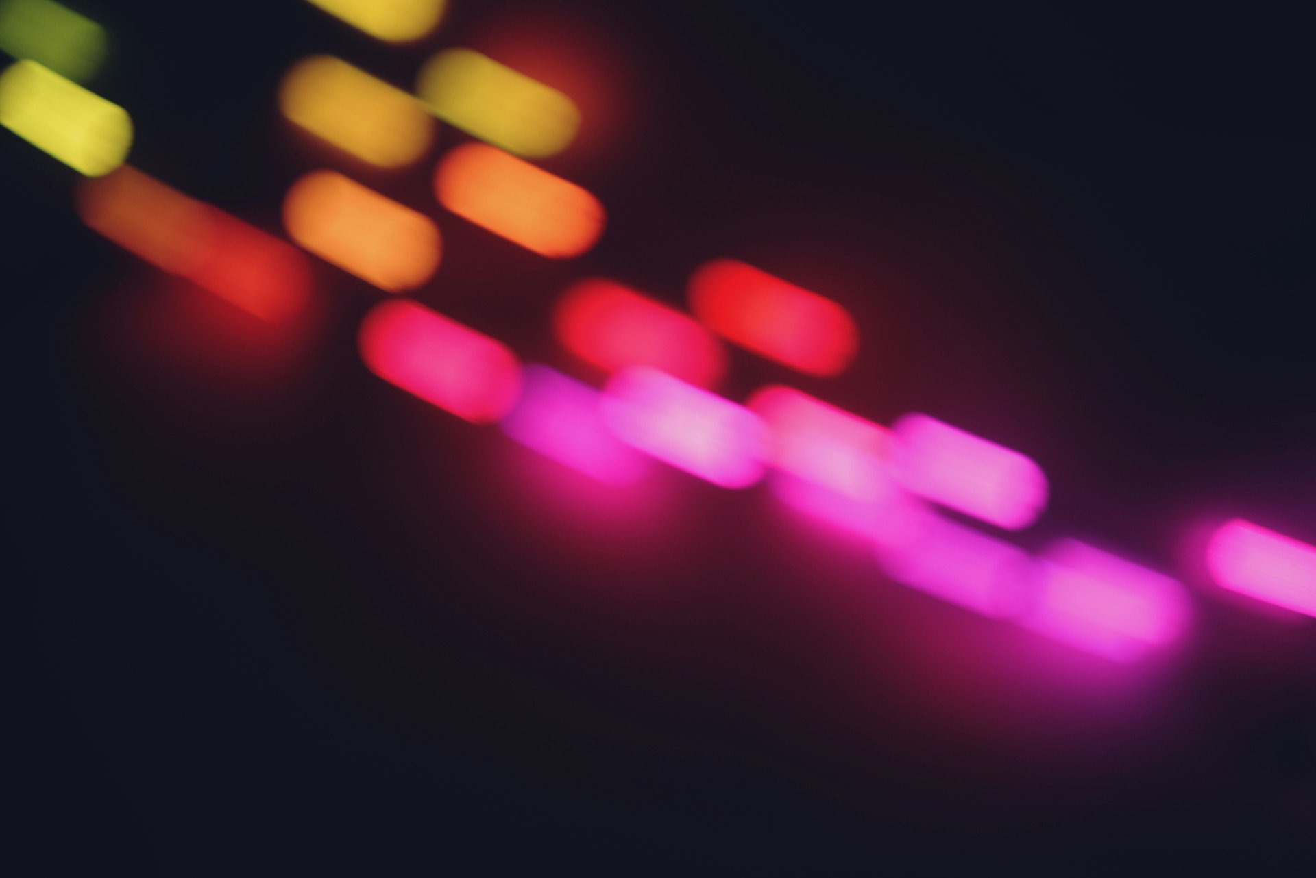 a black microphone with a blurry background