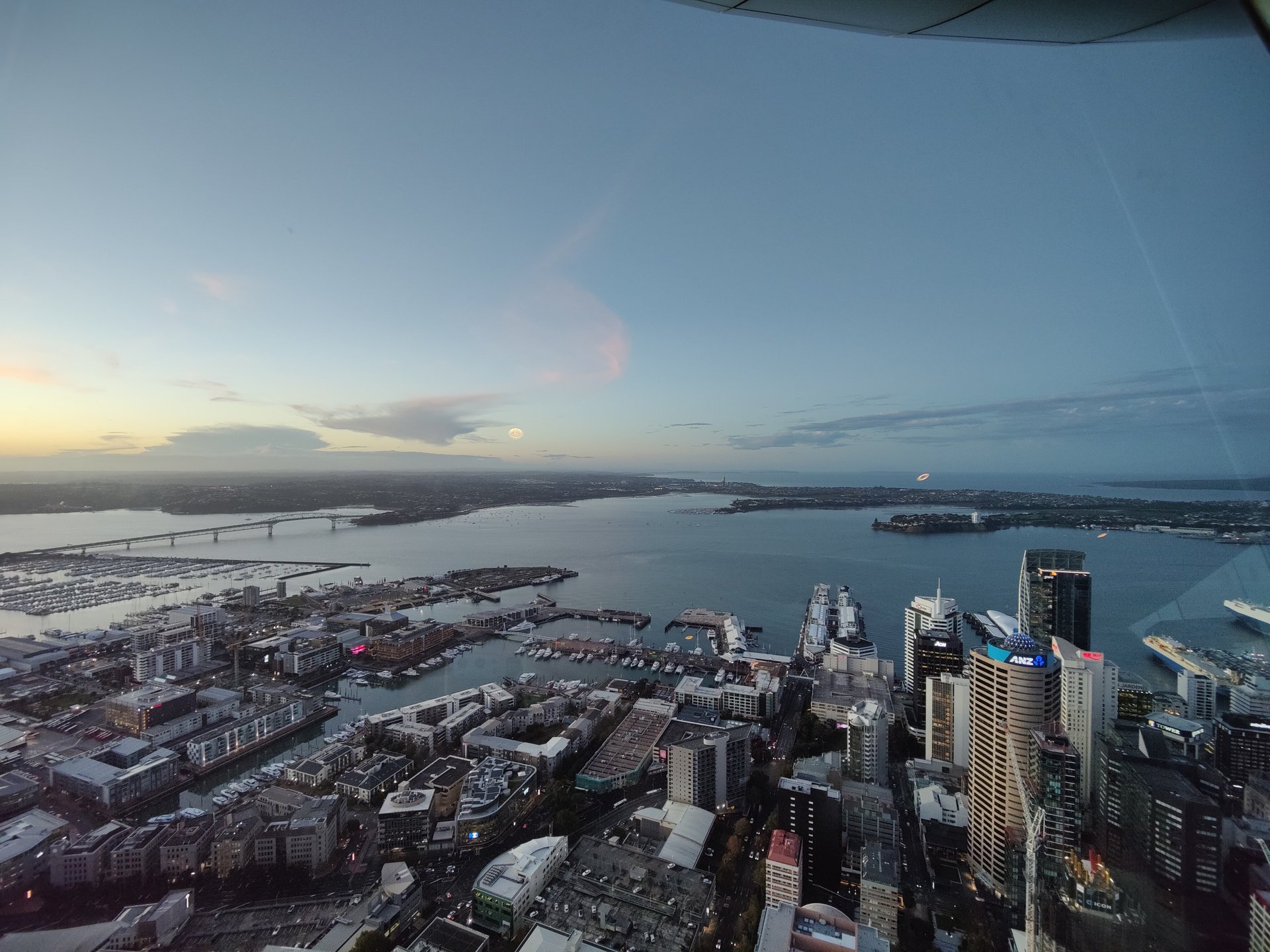 View from Auckland Skytower overlooking city, harbour bridge towards north shore.