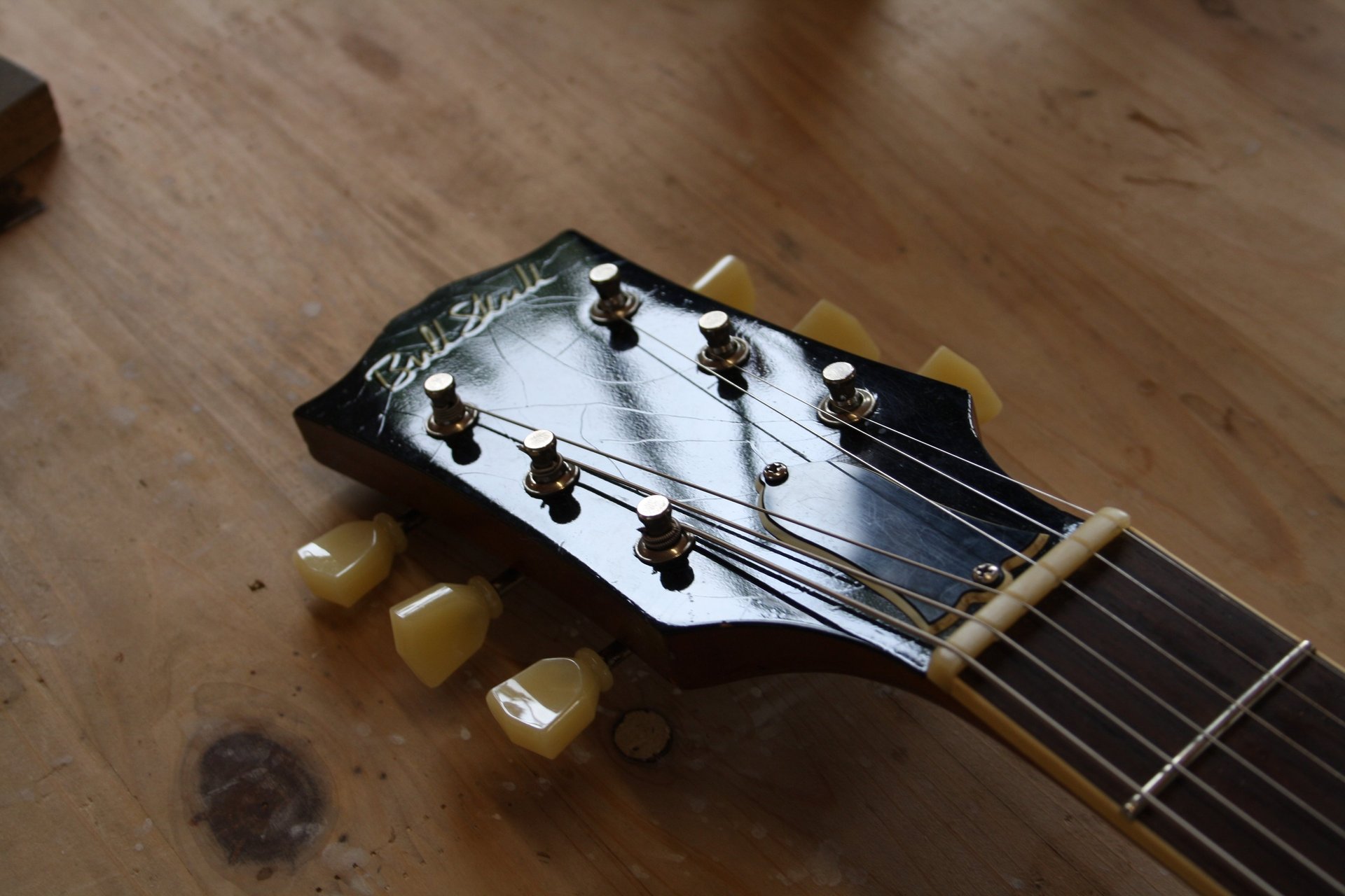an abstract photo of a curved building with a blue sky in the background