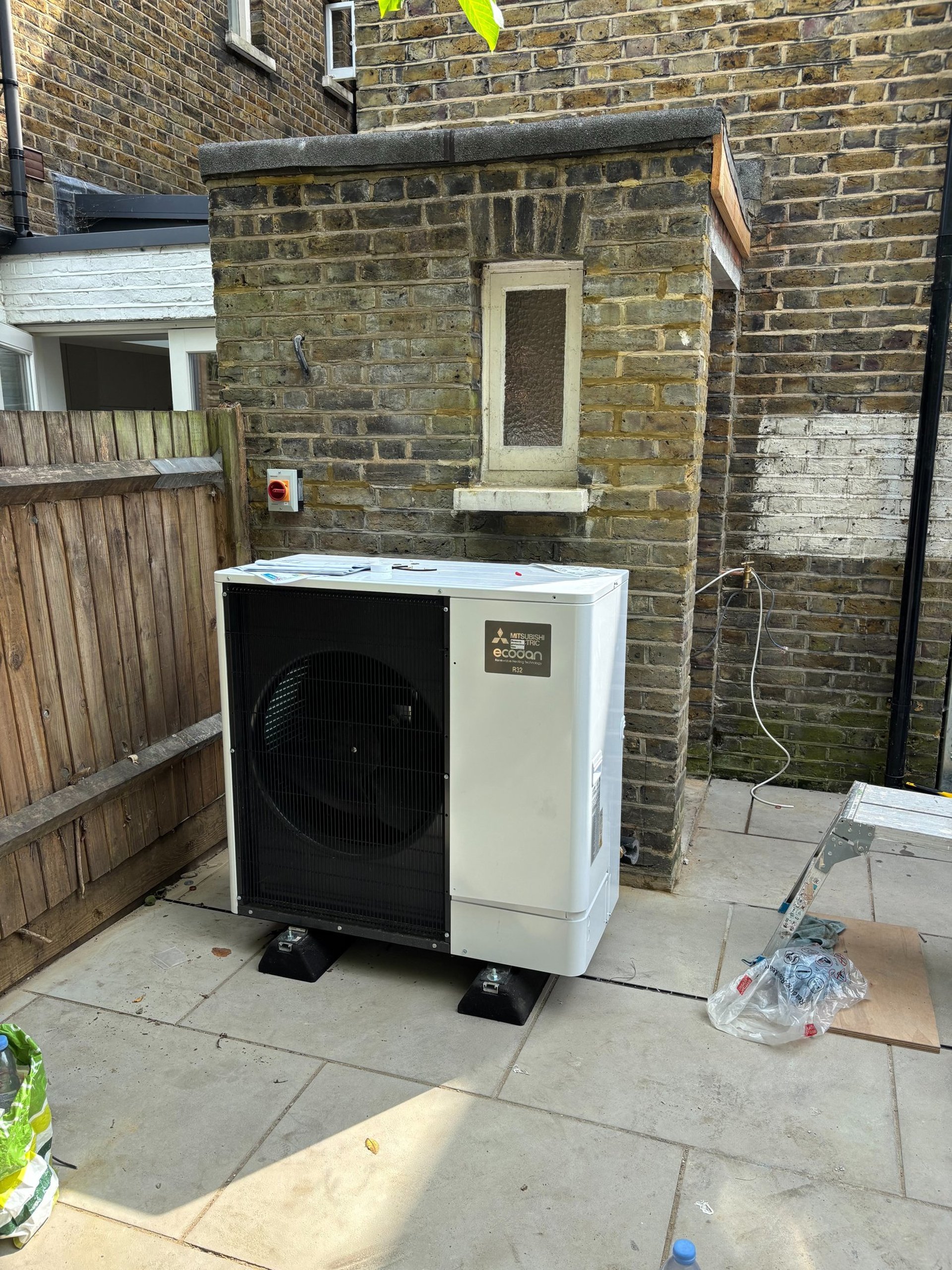 an abstract photo of a curved building with a blue sky in the background