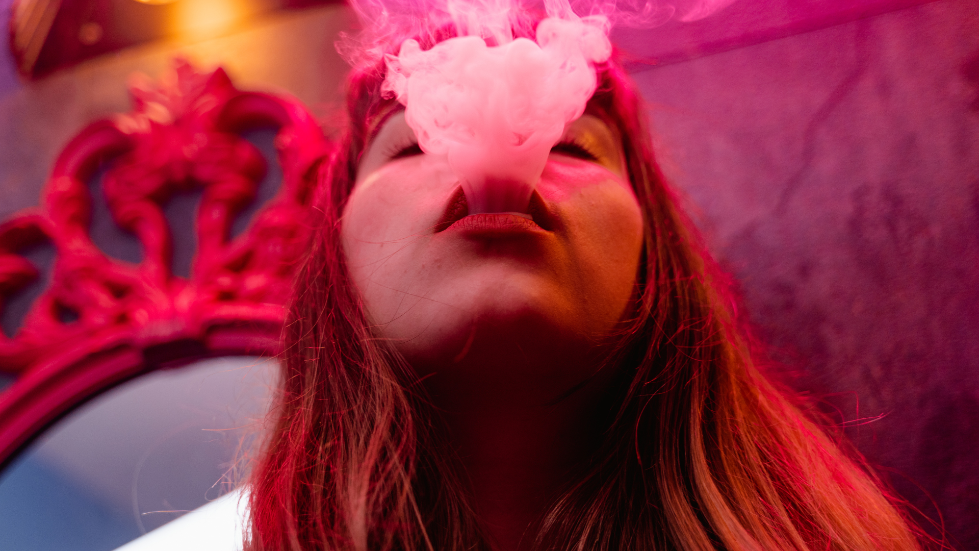 woman holding dried flower