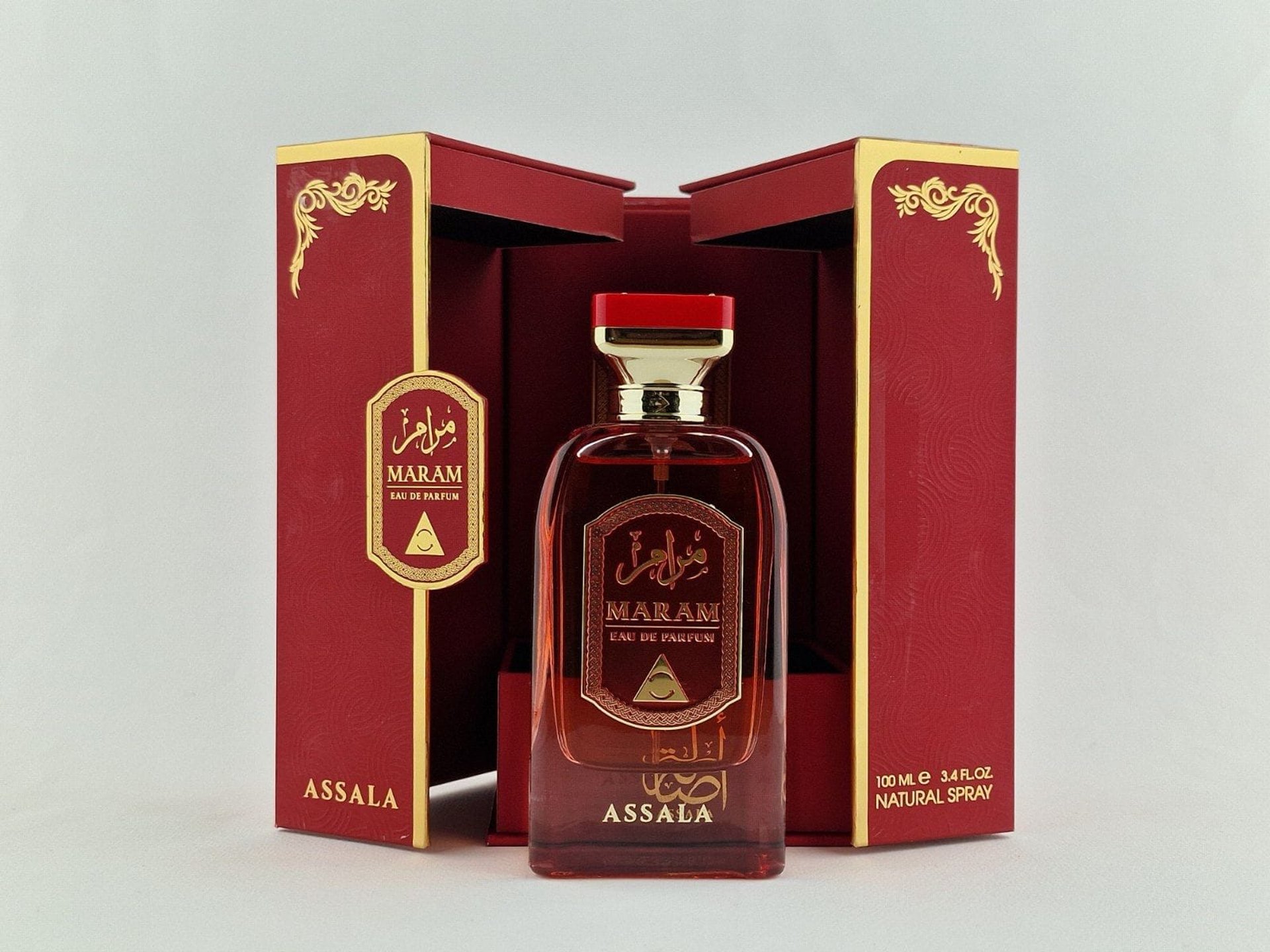 a bottle of perfume sitting on top of a table