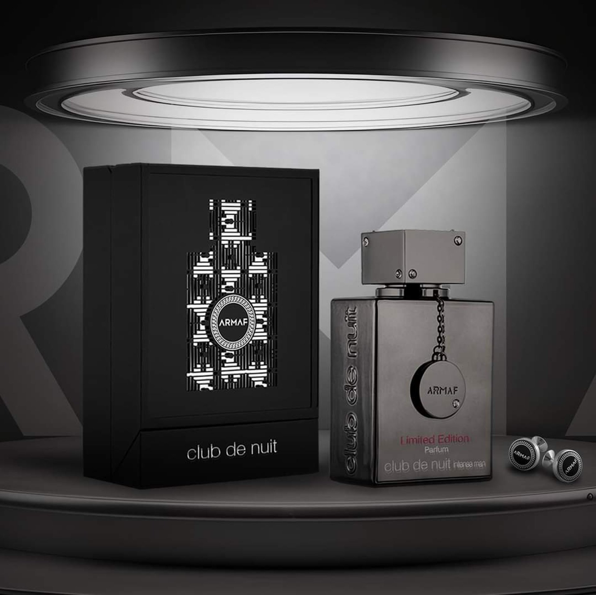 a bottle of perfume sitting on top of a table