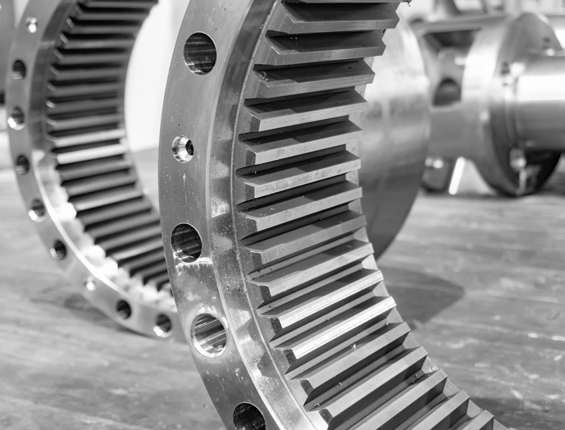 an abstract photo of a curved building with a blue sky in the background