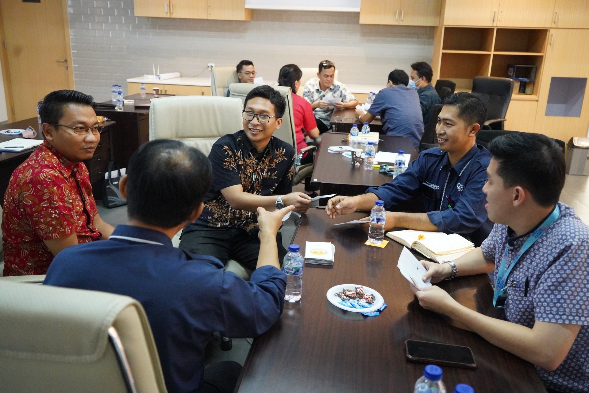 an abstract photo of a curved building with a blue sky in the background