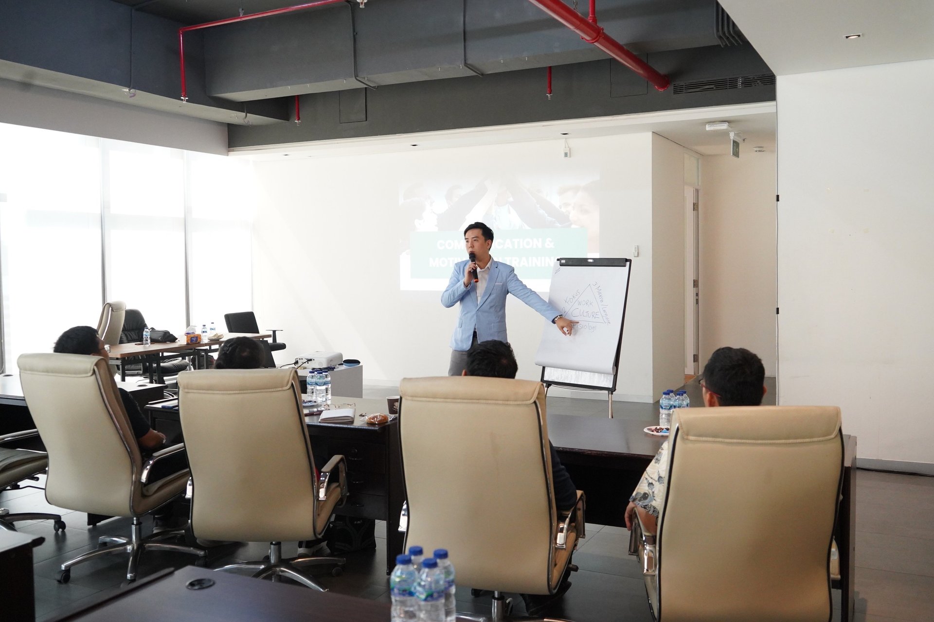 an abstract photo of a curved building with a blue sky in the background