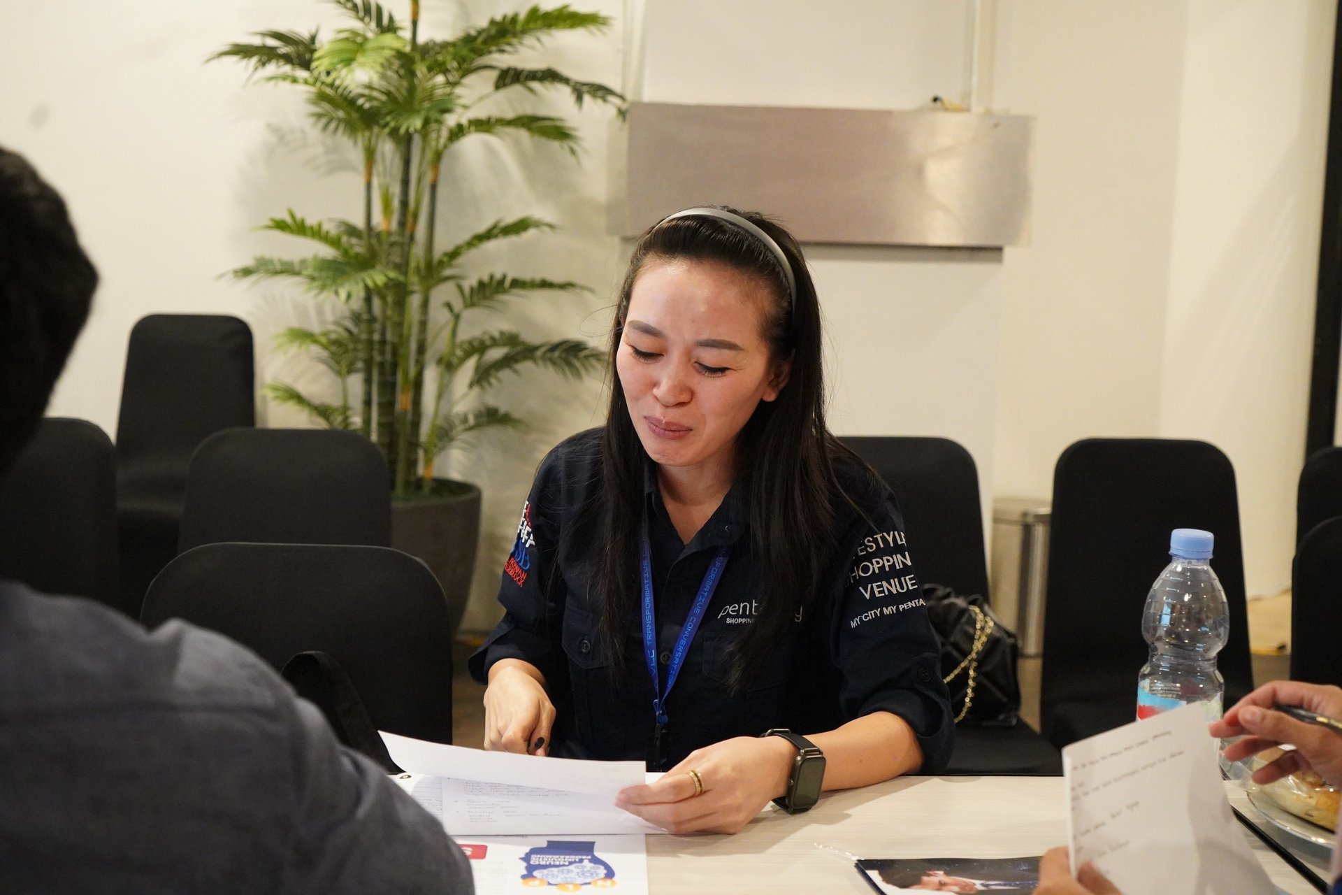 an abstract photo of a curved building with a blue sky in the background