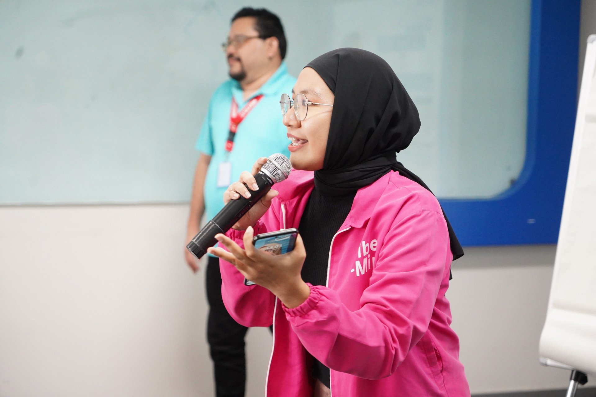 an abstract photo of a curved building with a blue sky in the background