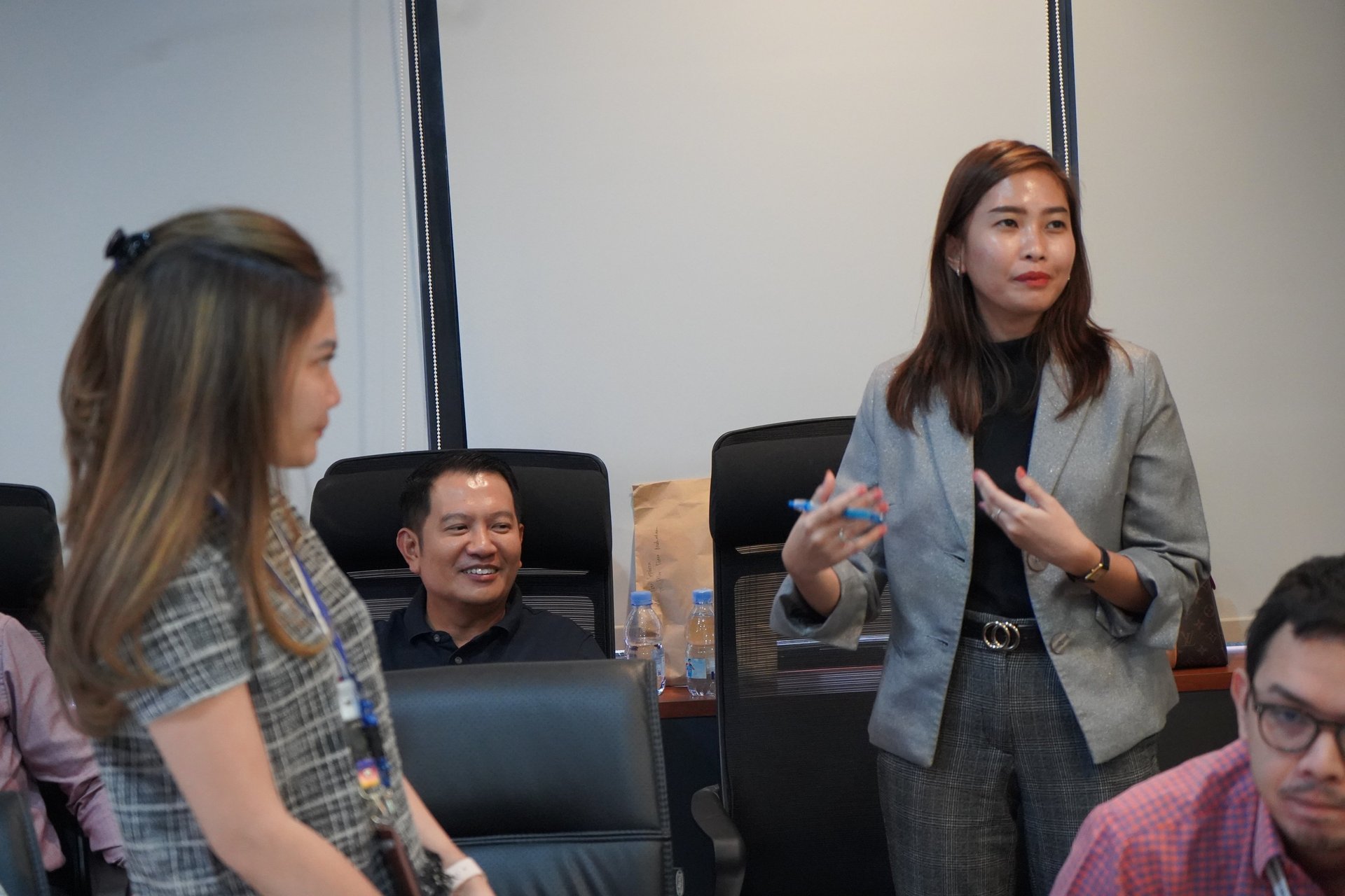 an abstract photo of a curved building with a blue sky in the background