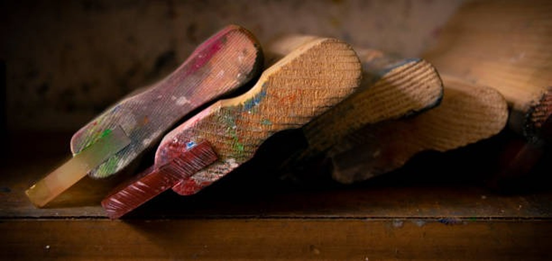 black and brown leather padded tub sofa